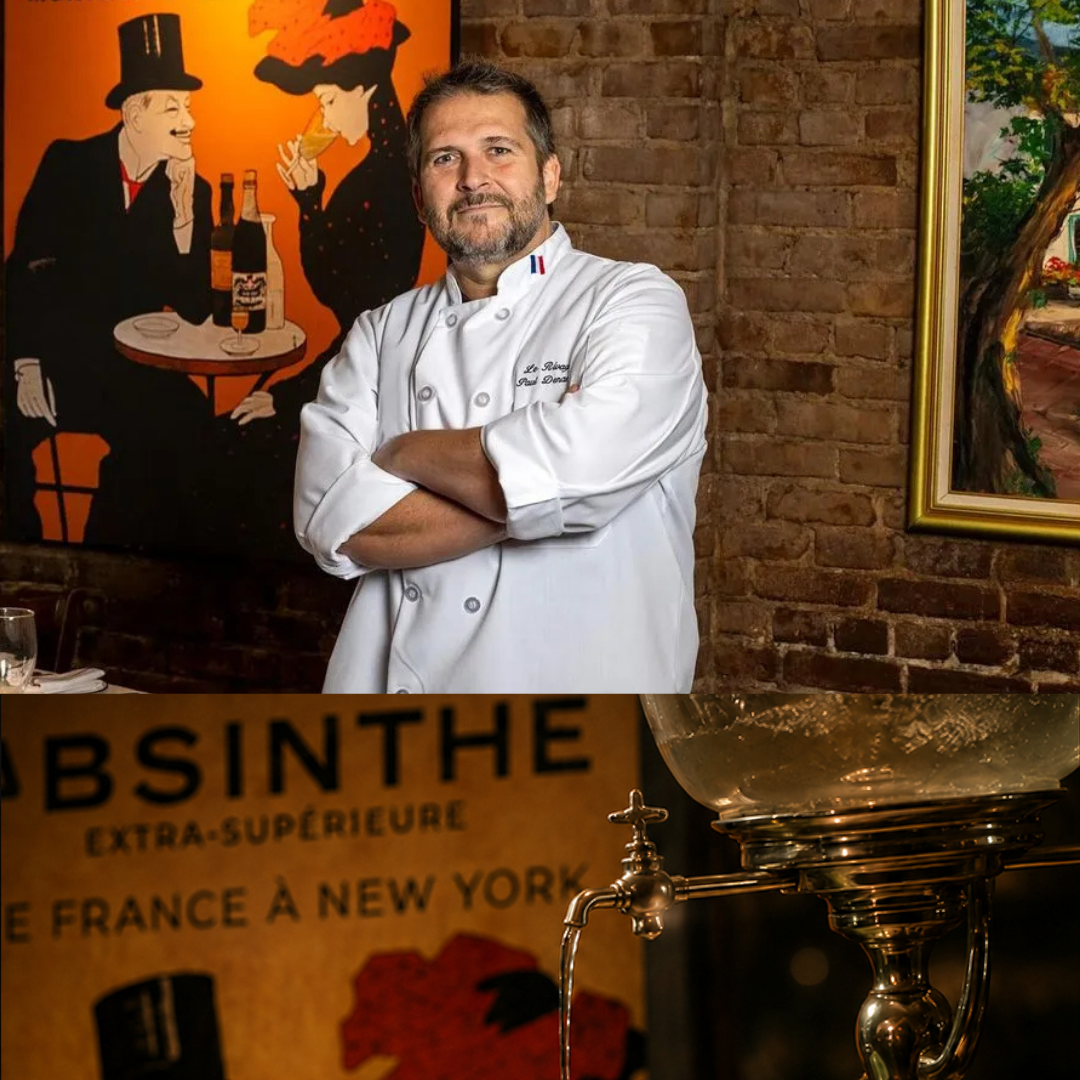 Chef Paul of Le Rivage standing in front of his Absinthe Poster