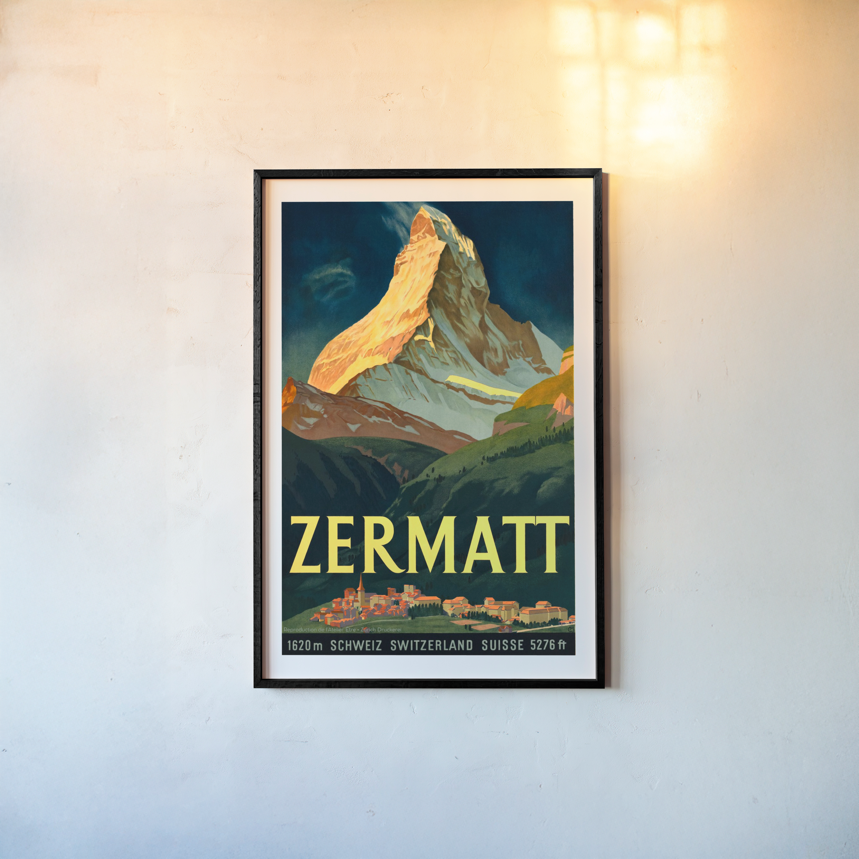 Framed poster of Zermatt hanging on a light background