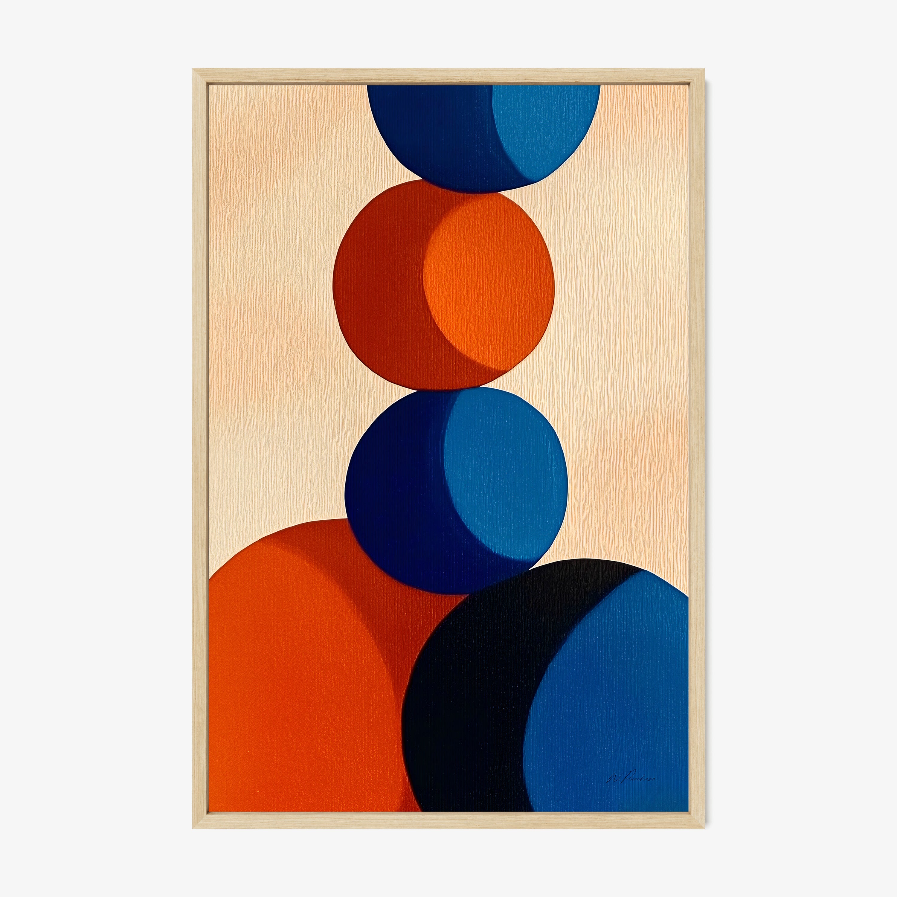 Framed poster of red and blue circle stacked on each other hanging on a light background