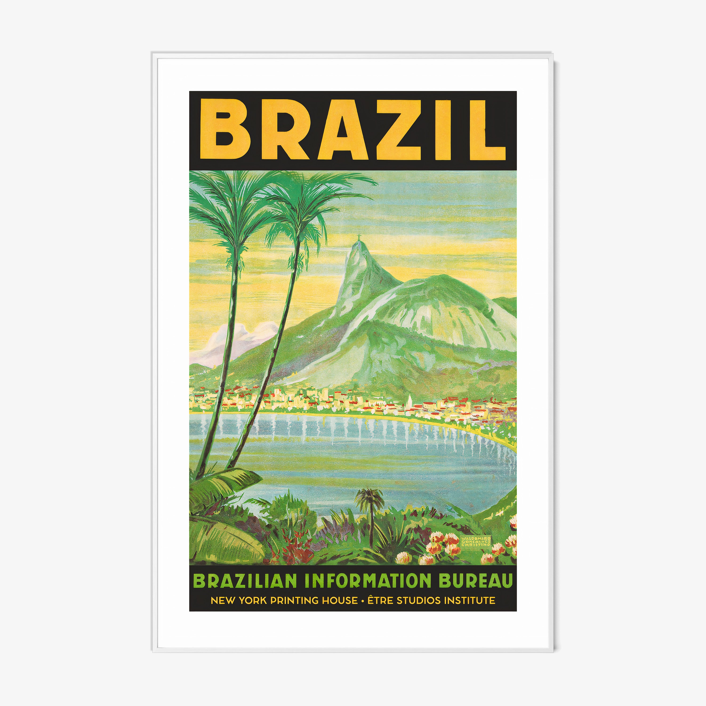 Framed poster of a waterfront with mountains in the background and the words "Brazil" in large letters at the top sitting on a light background