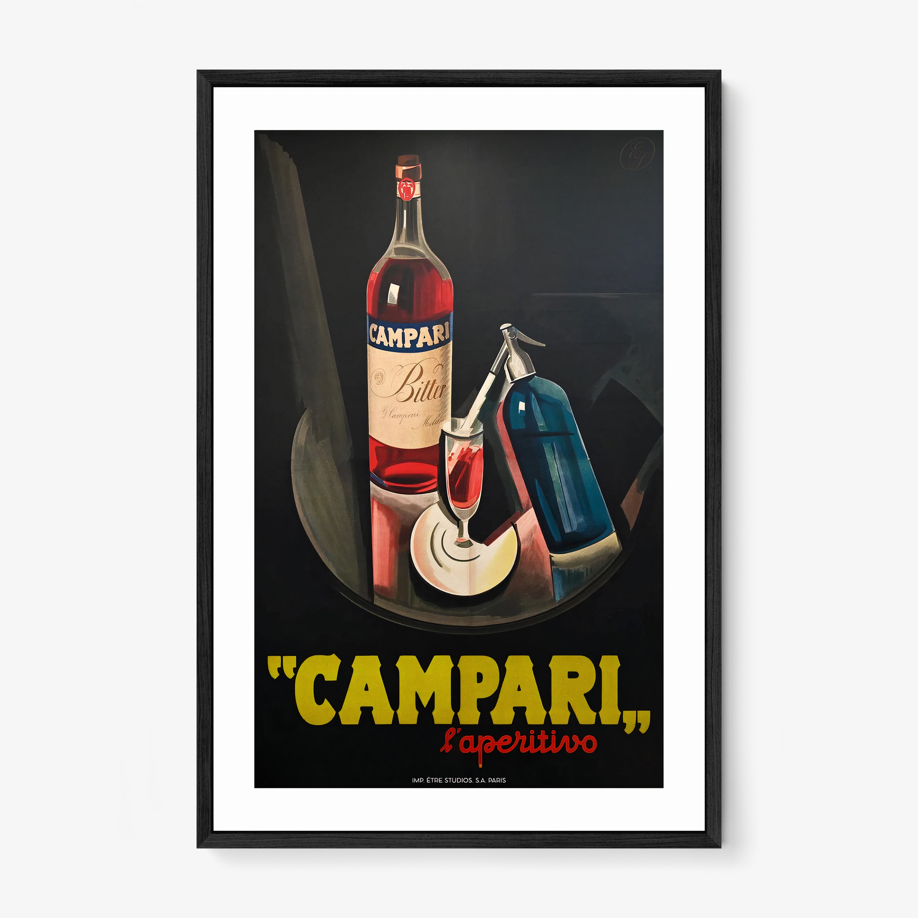 A framed poster features "Campari" with a bottle in the background