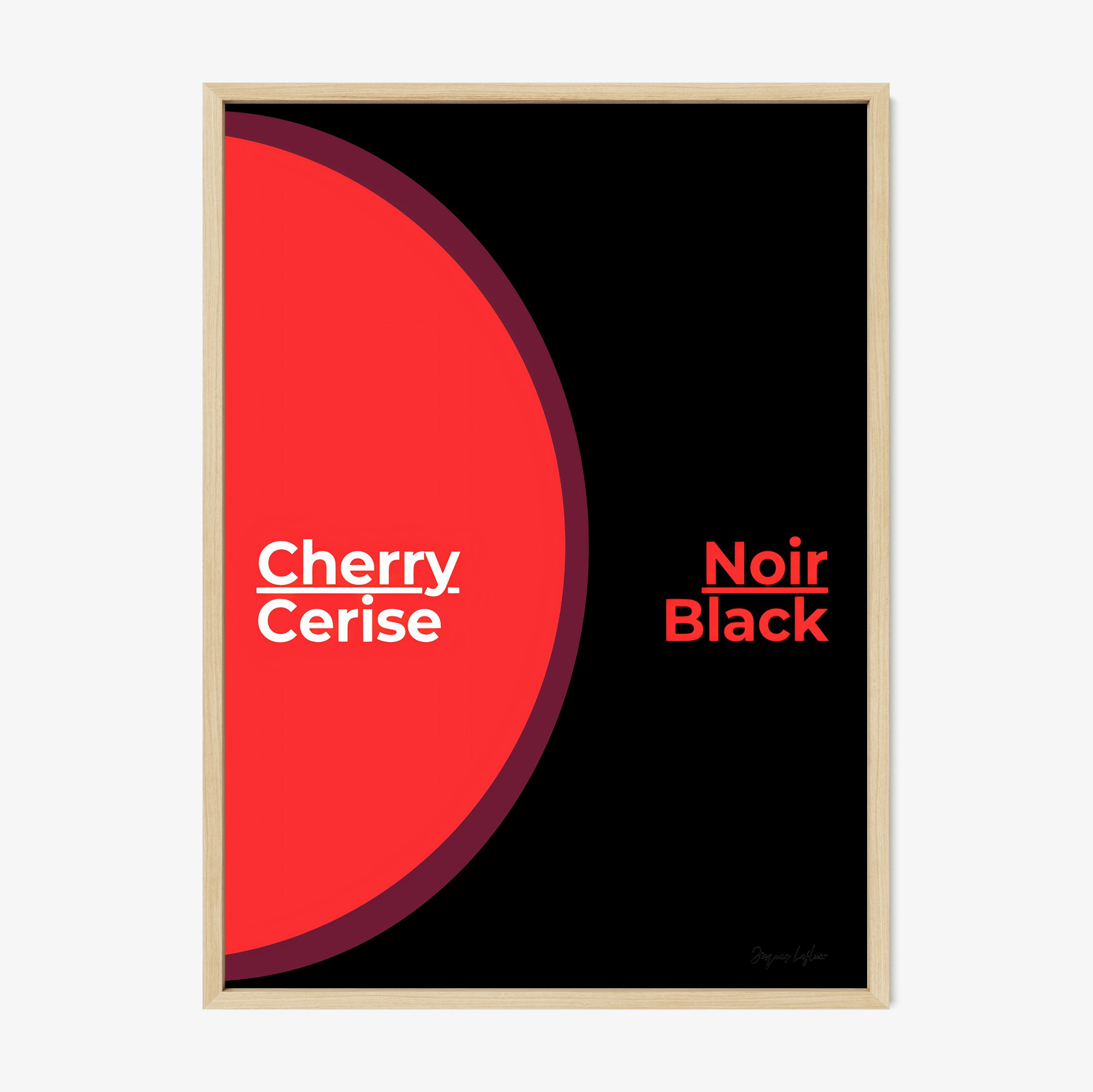 Framed poster of the words "Cherry Black" in English and French hanging on a light background