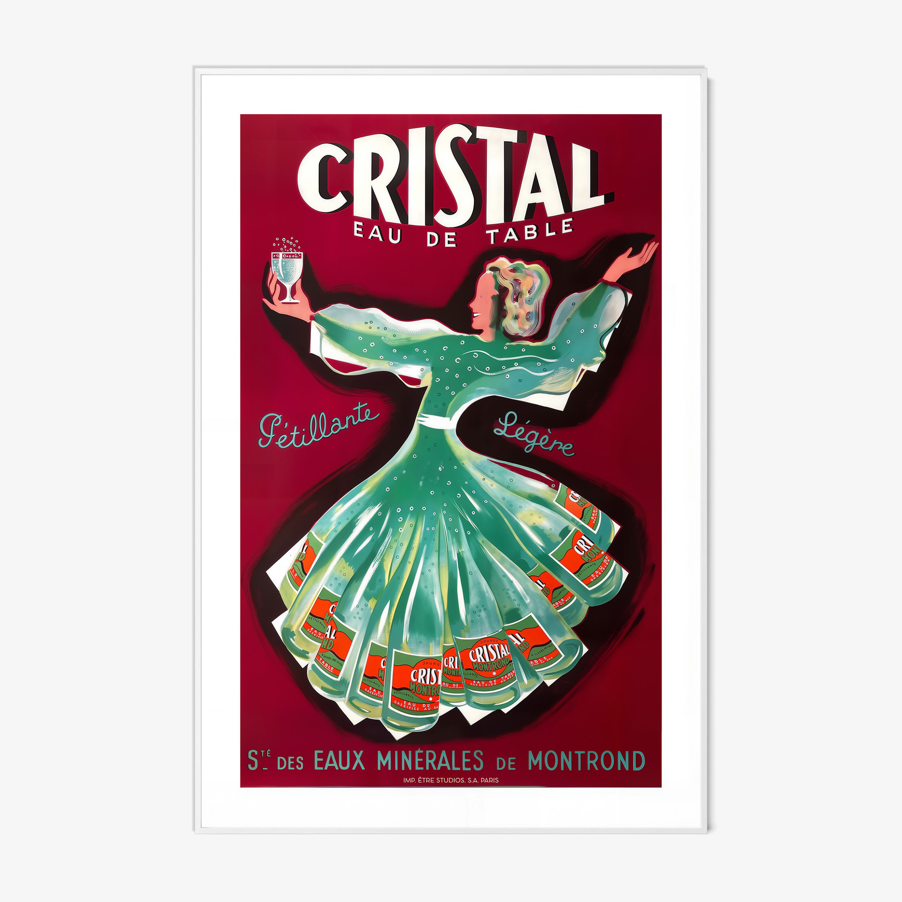 A framed poster features a whimsical woman dancing holding a glass of cristal