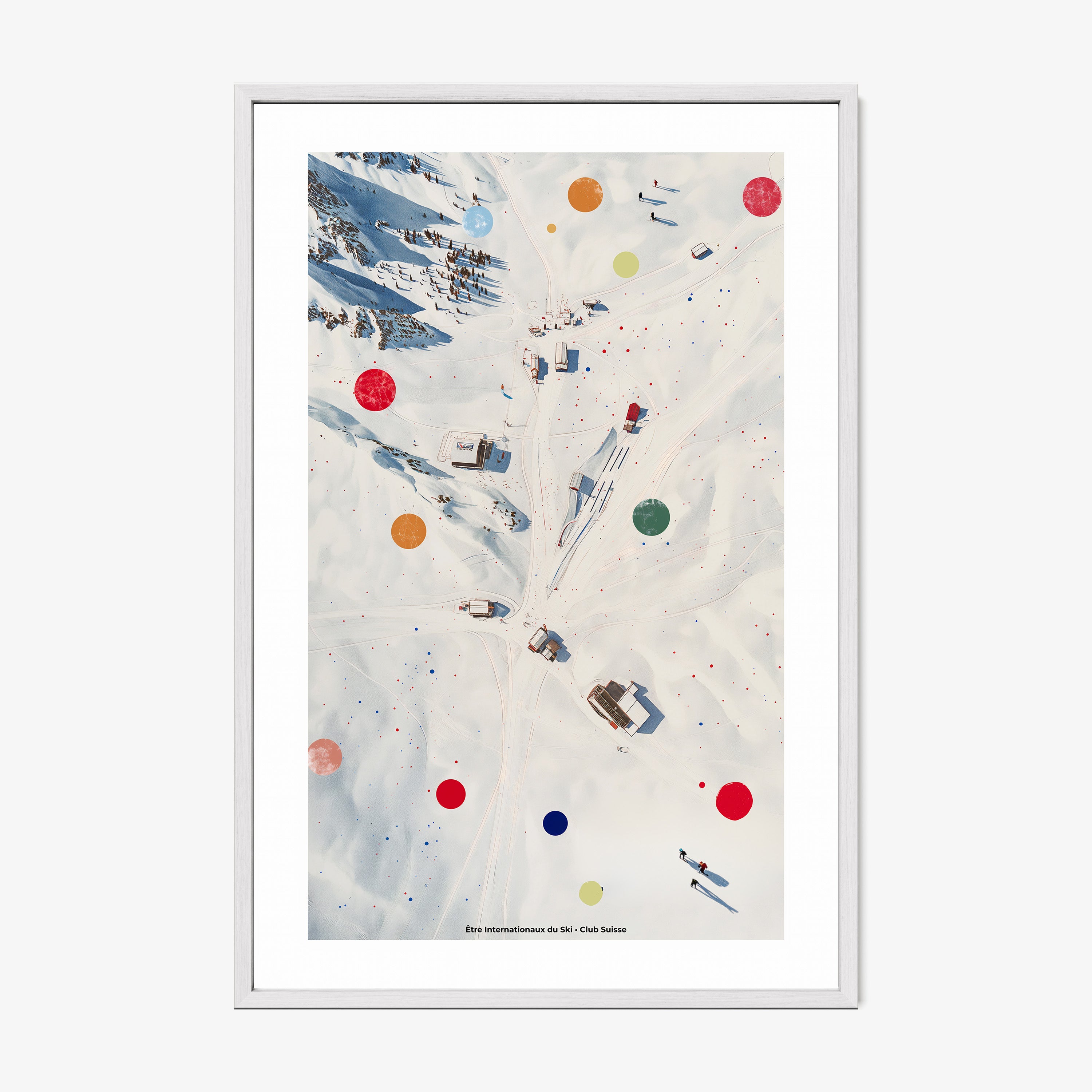 Framed poster of an overhead view of a snowy covered ski area hanging on a light background