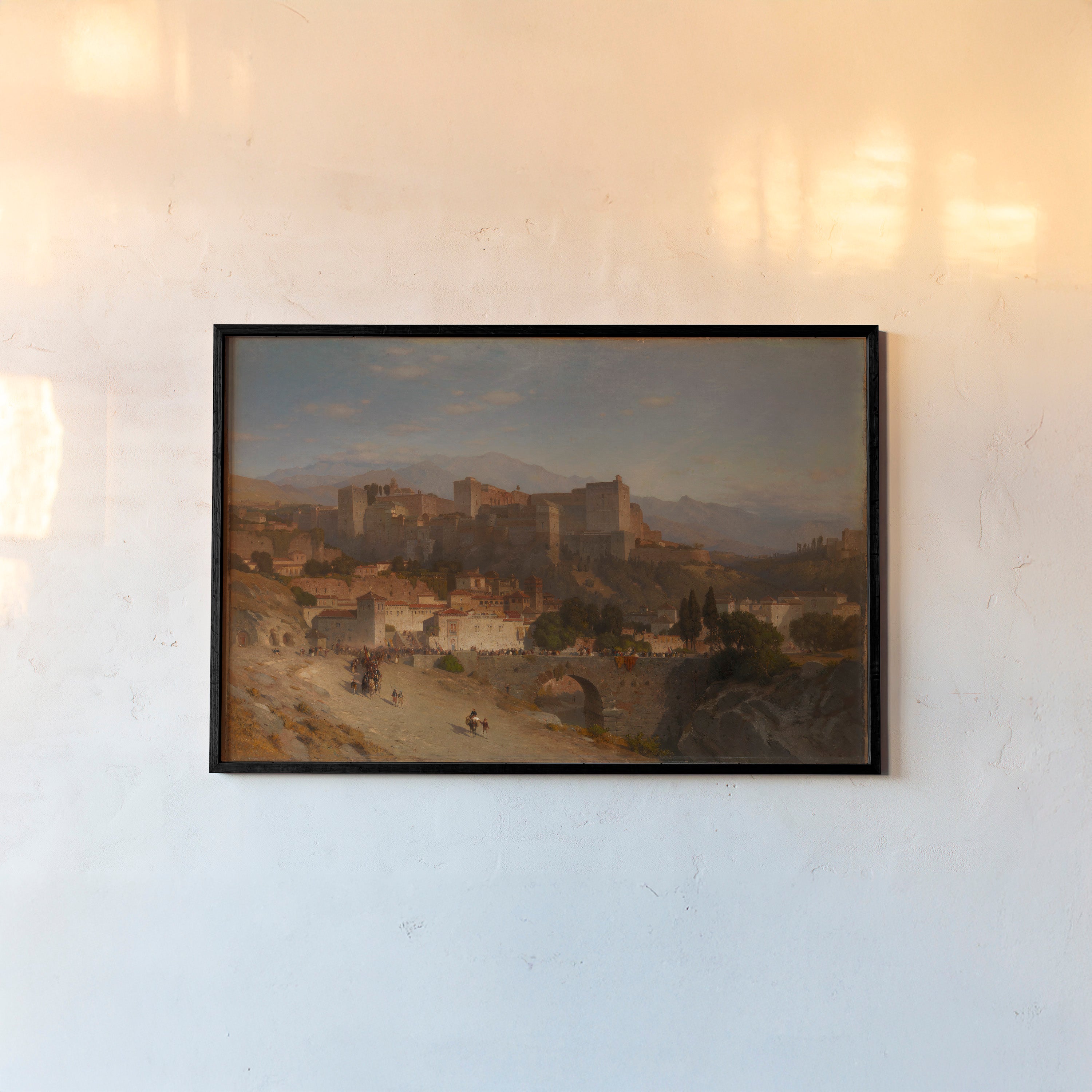 Framed "Hills of Alhambra" poster hanging on a light background