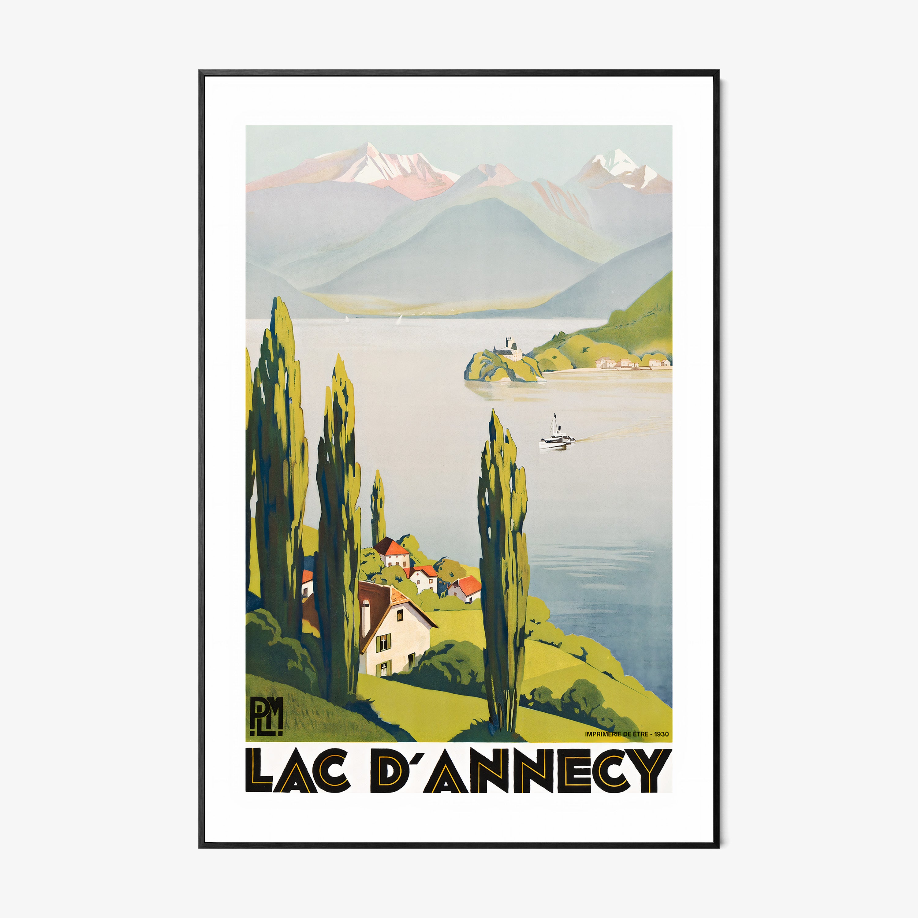 Framed "Lac D'Annecy" poster featuring a lake with a scenic mountain background hanging on a light background