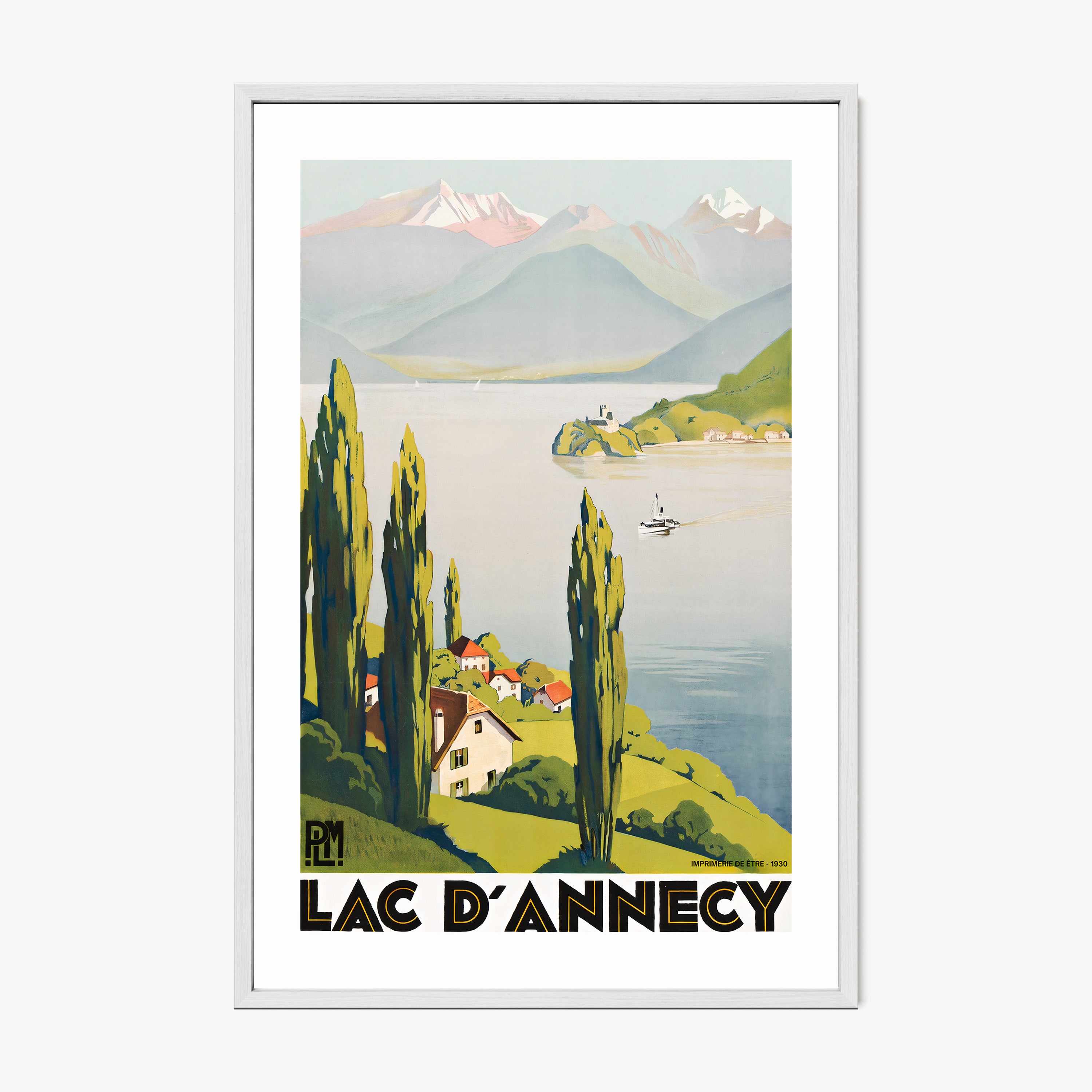 Framed "Lac D'Annecy" poster featuring a lake with a scenic mountain background hanging on a light background