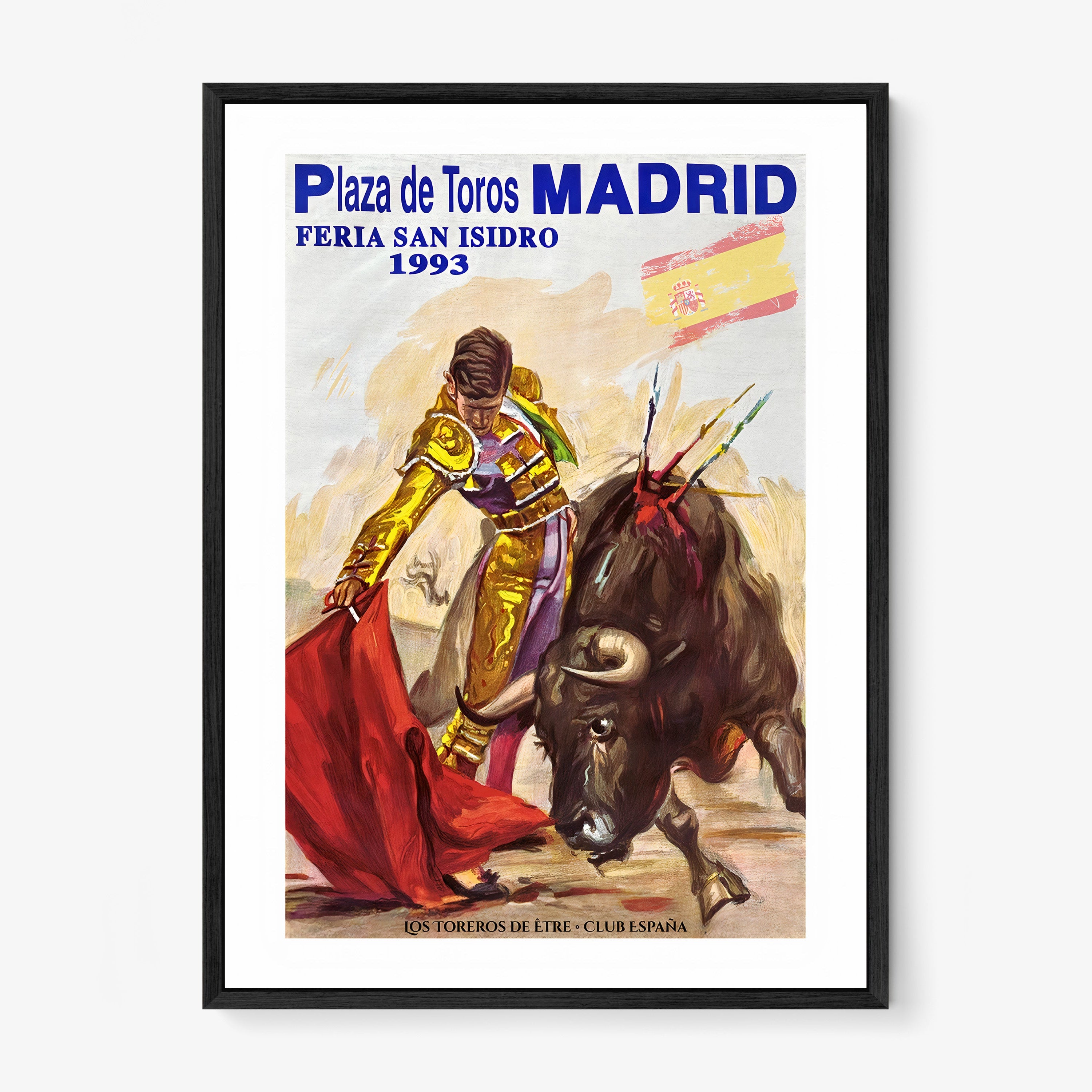 Framed poster of a bullfighter from Madrid hanging on a light background