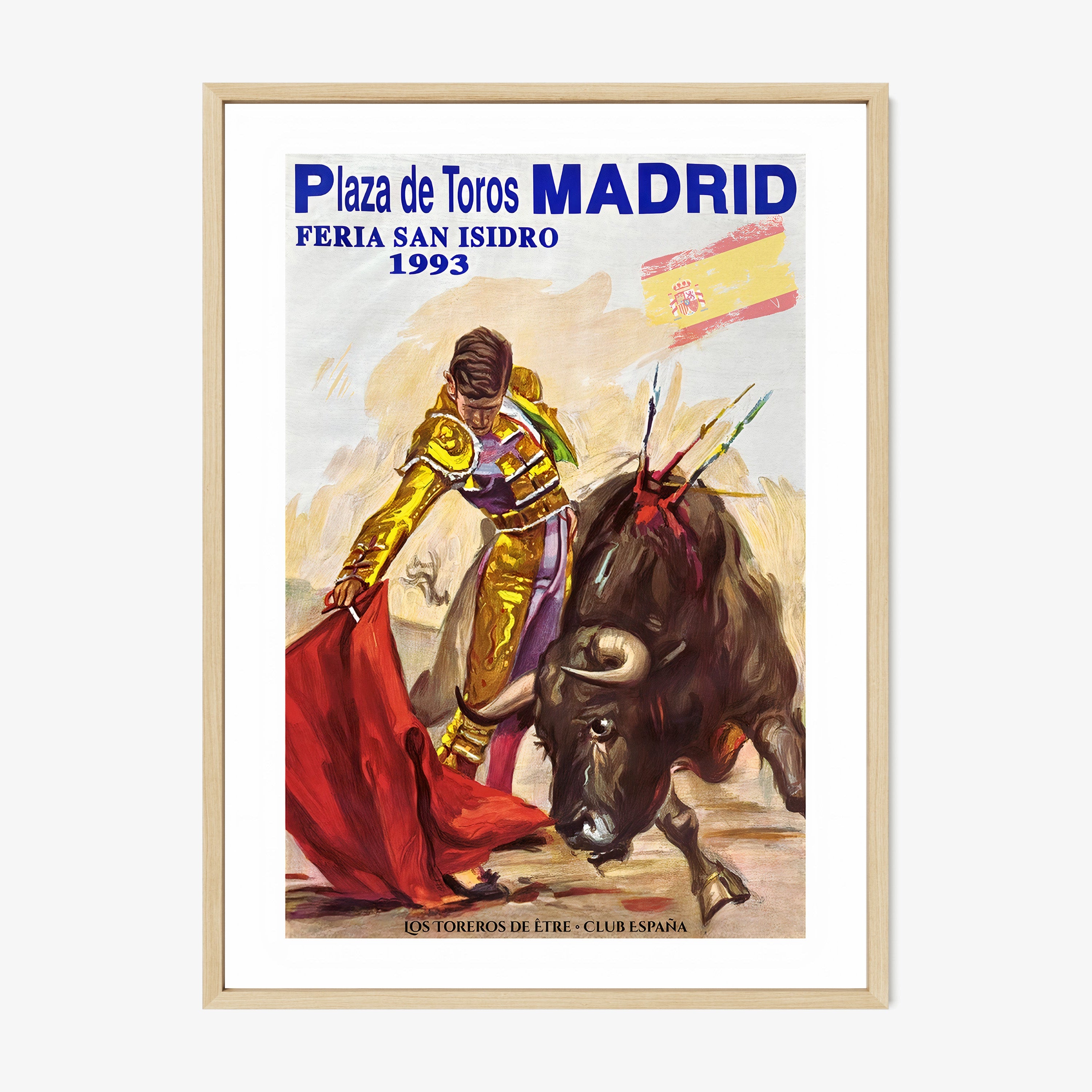 Framed poster of a bullfighter from Madrid hanging on a light background