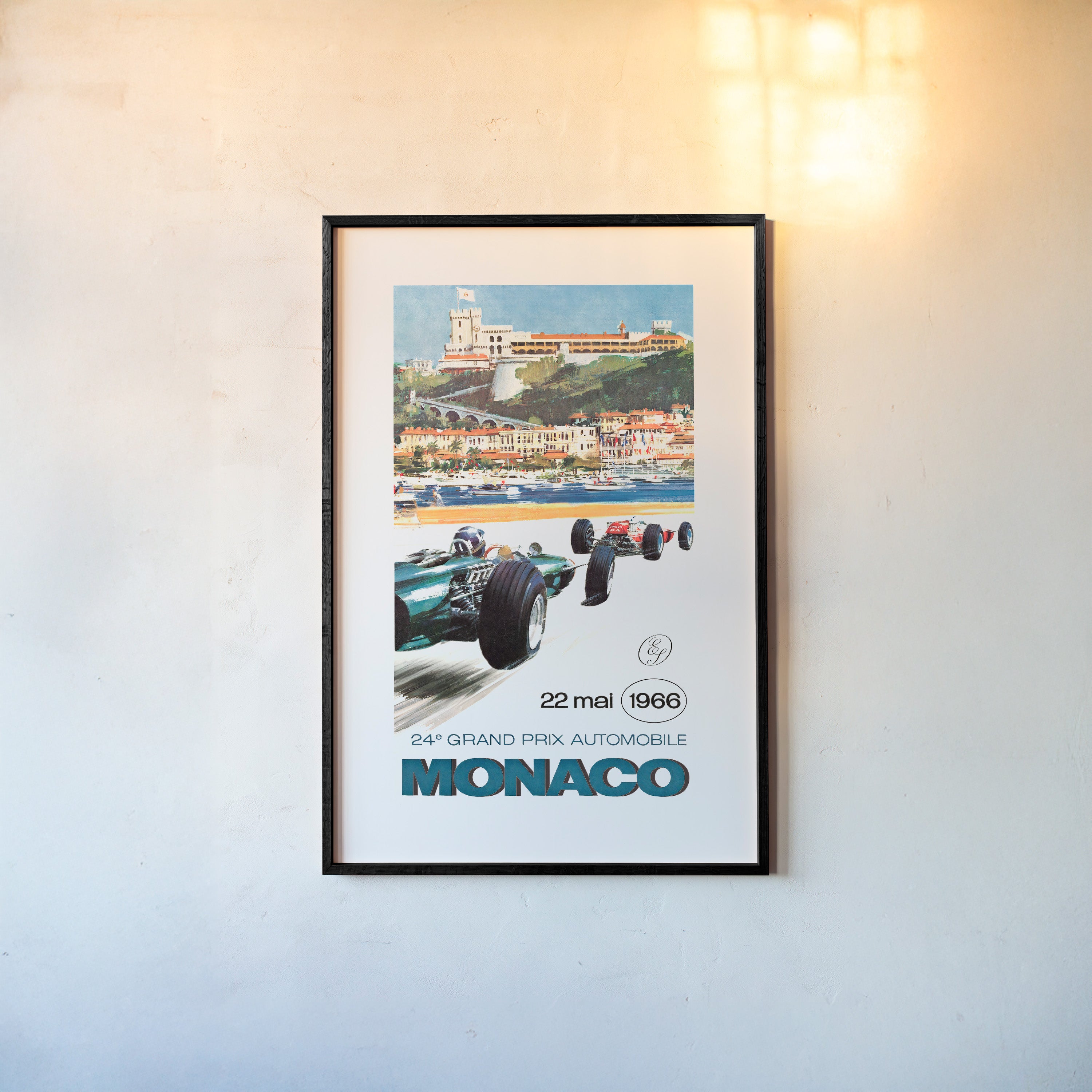 A framed poster features the Monaco Grand Prix from 1966