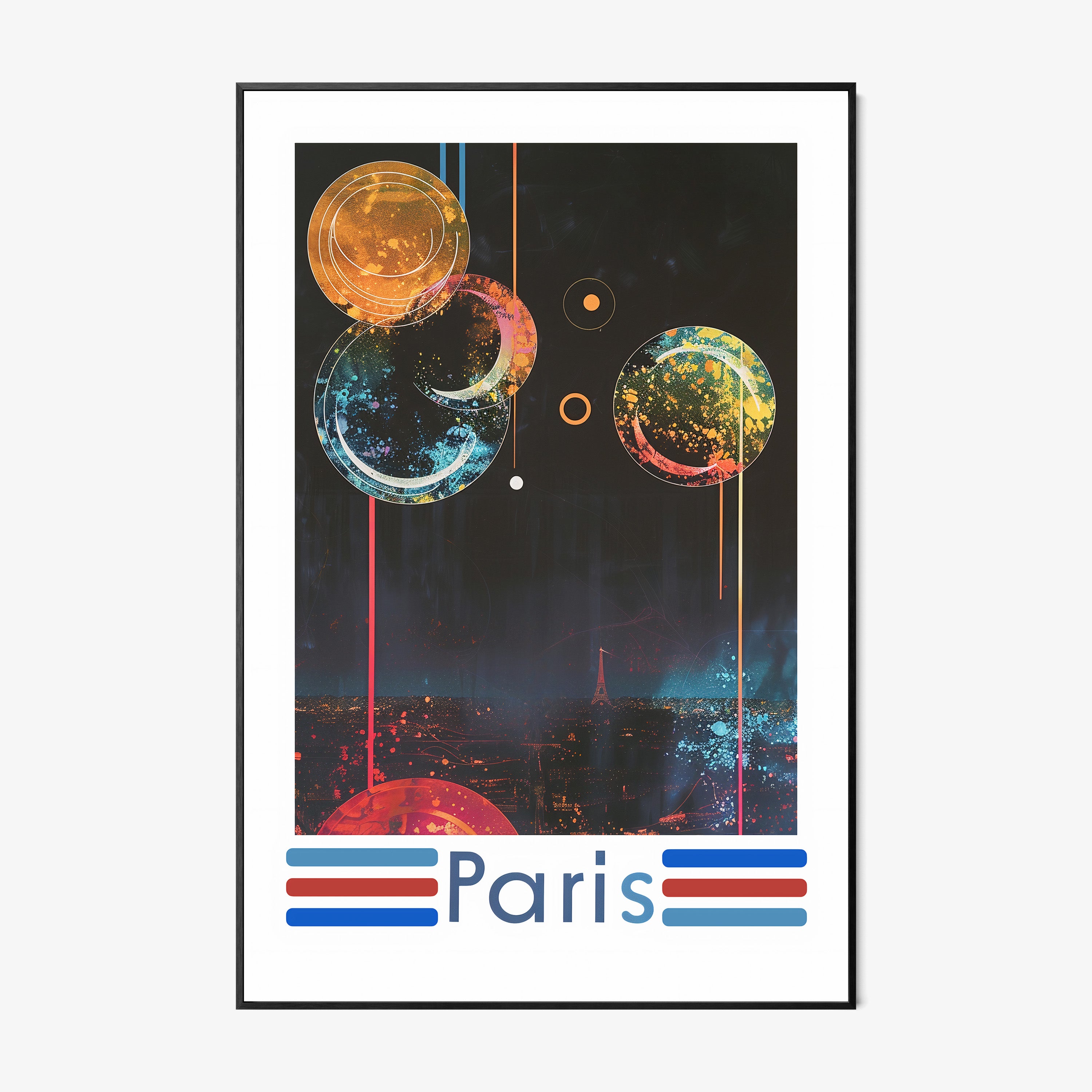 Framed poster of a colorful nighttime scene over Paris on a wall with a light background