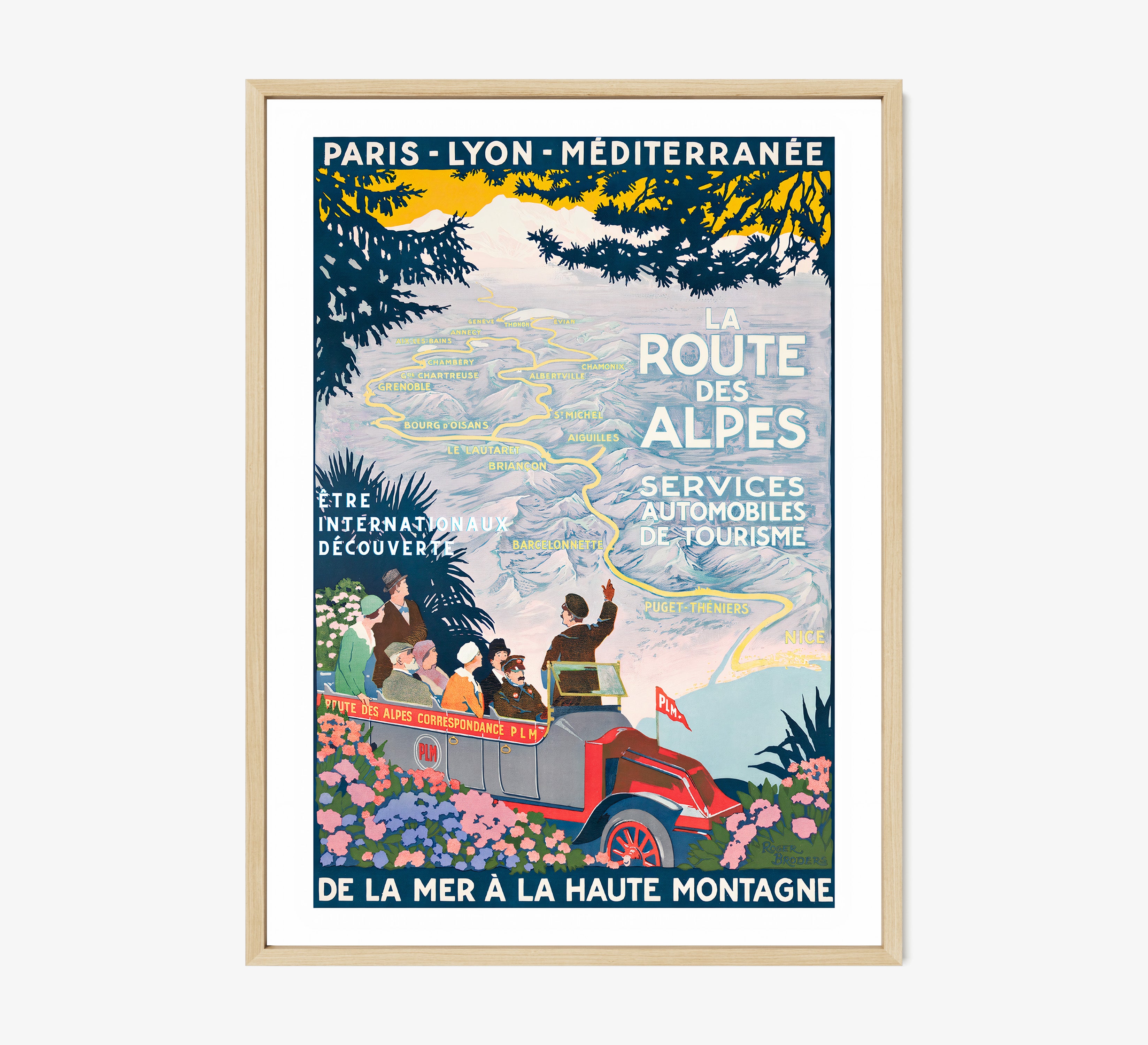 Framed poster featuring a map through the mountains and a tour guide with the text "La Route Des Alpes" at the center hanging on a light background