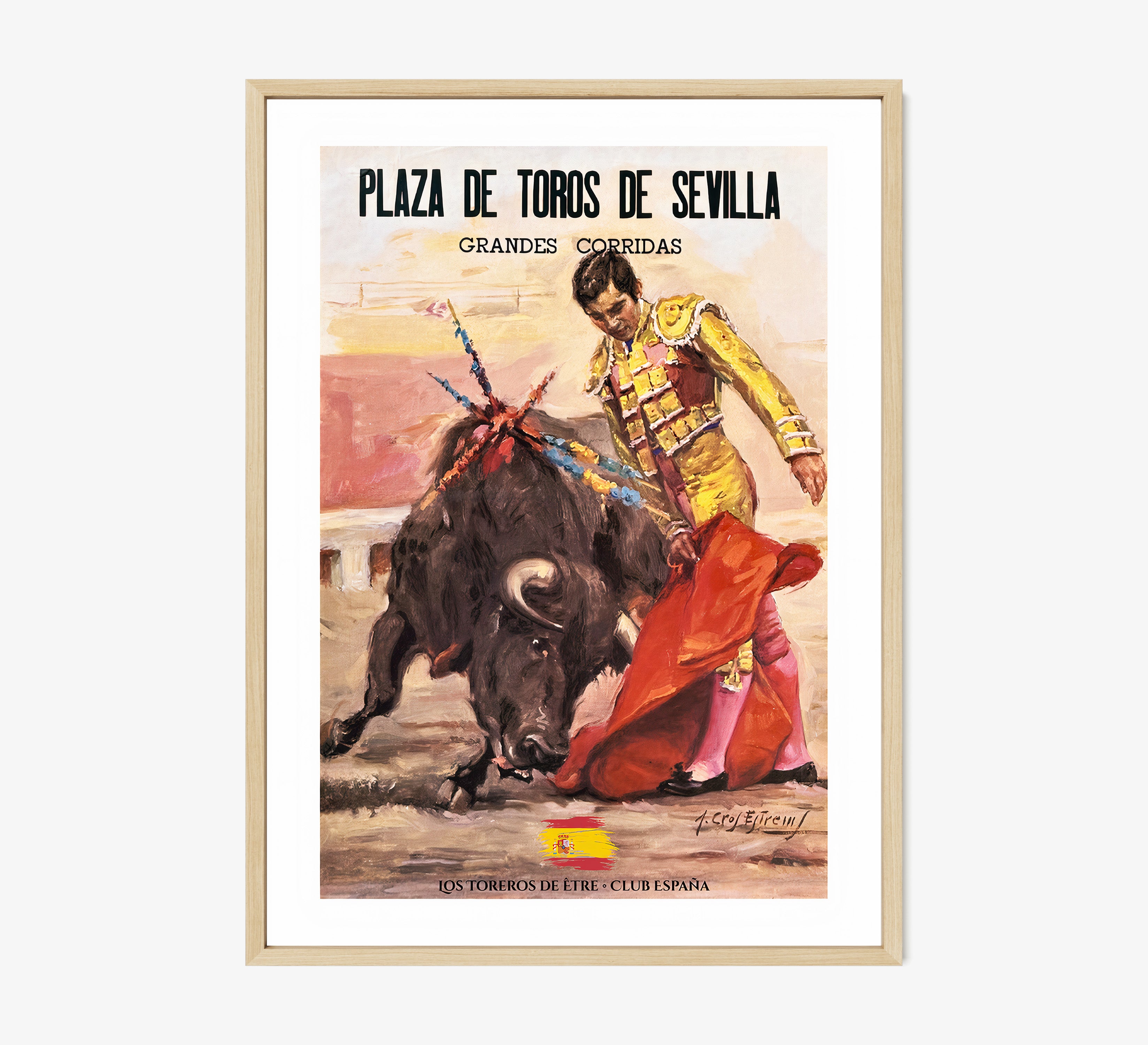Framed poster of a bullfighter hanging on a light background
