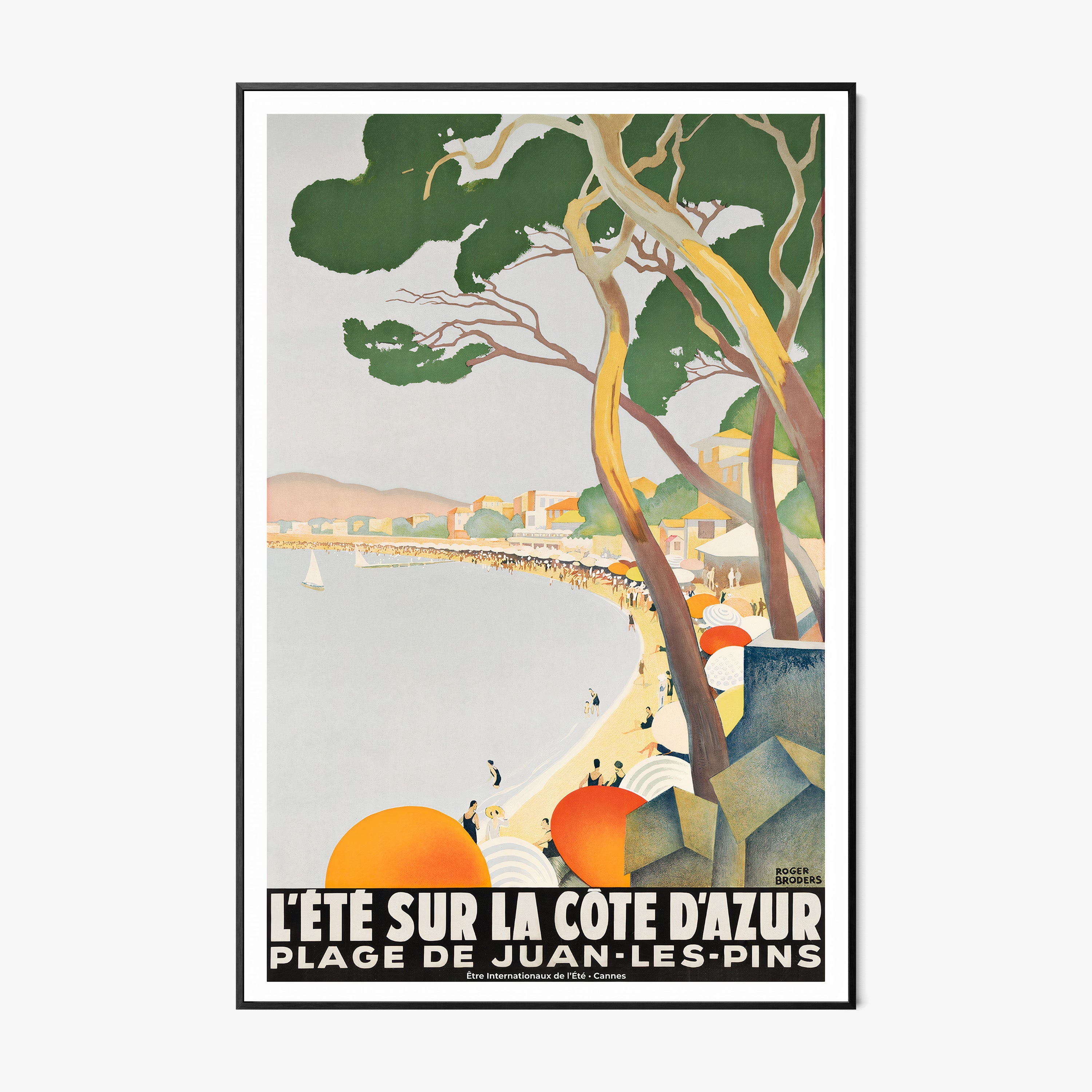 Framed poster of a coastal beach area hanging on a light background
