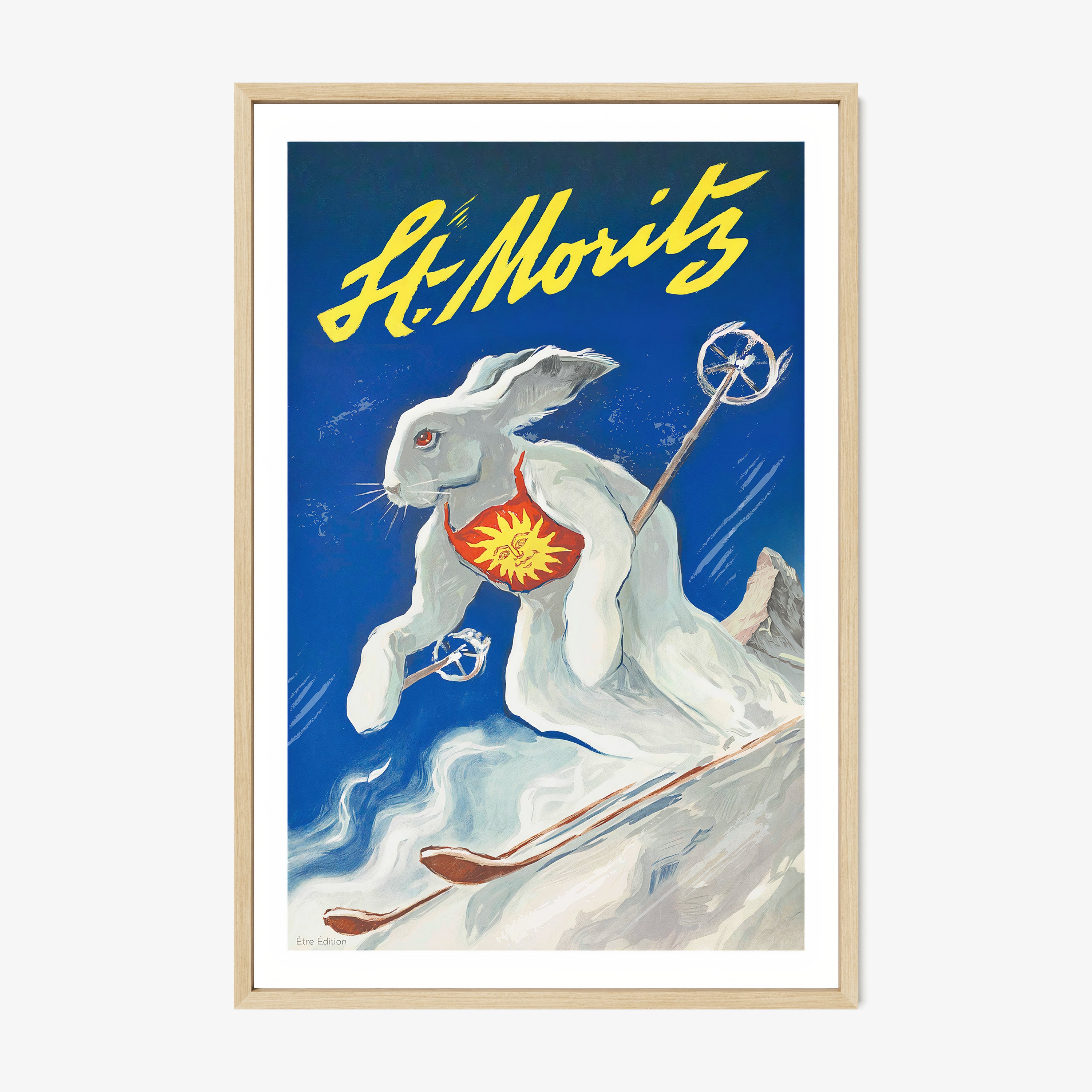 Framed poster of a white rabbit on skis with the text "St Moritz" at the top