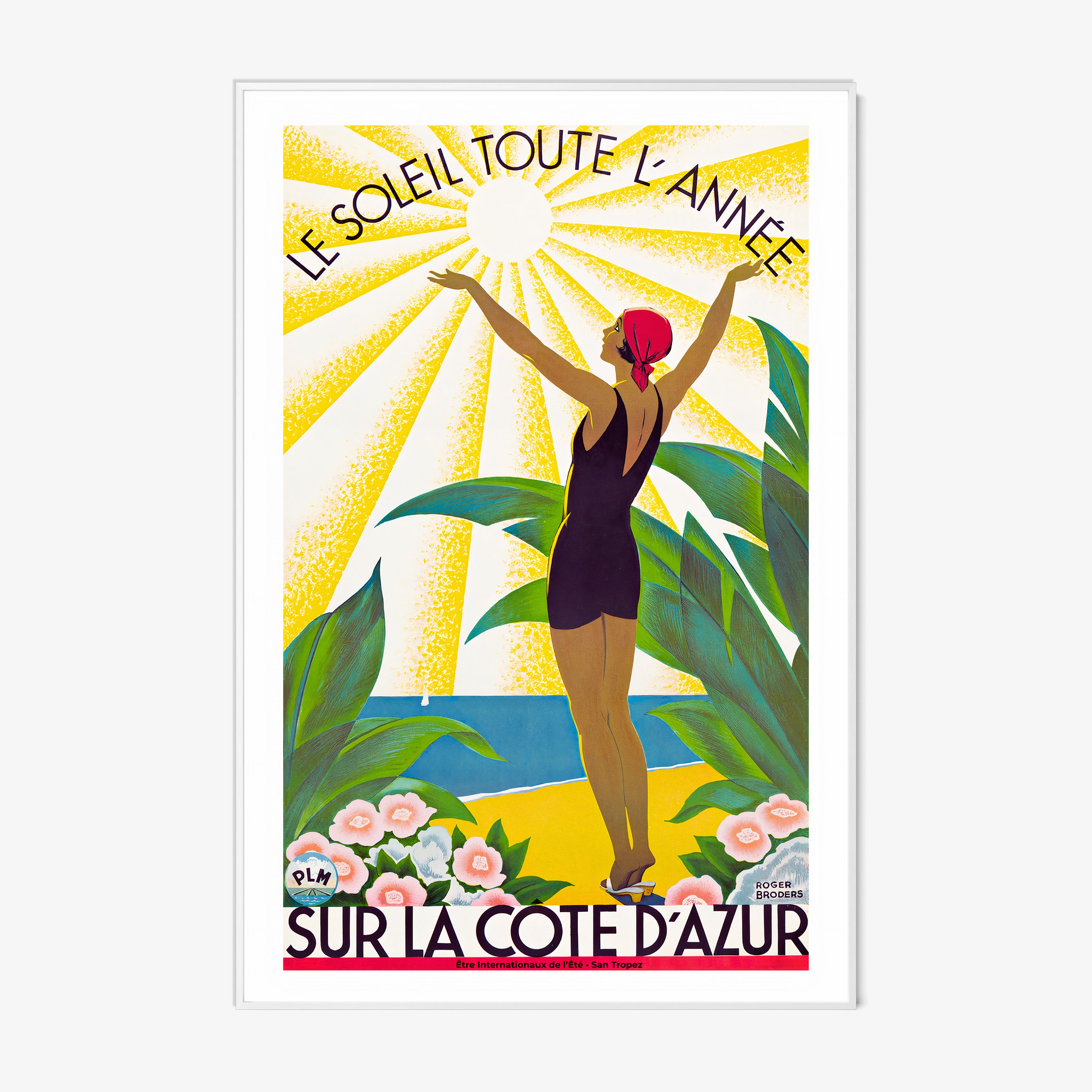 Framed poster of a woman standing with her arms raised to the sun and the text "Sur La Cote D'Azur" at the bottom hanging on a light background