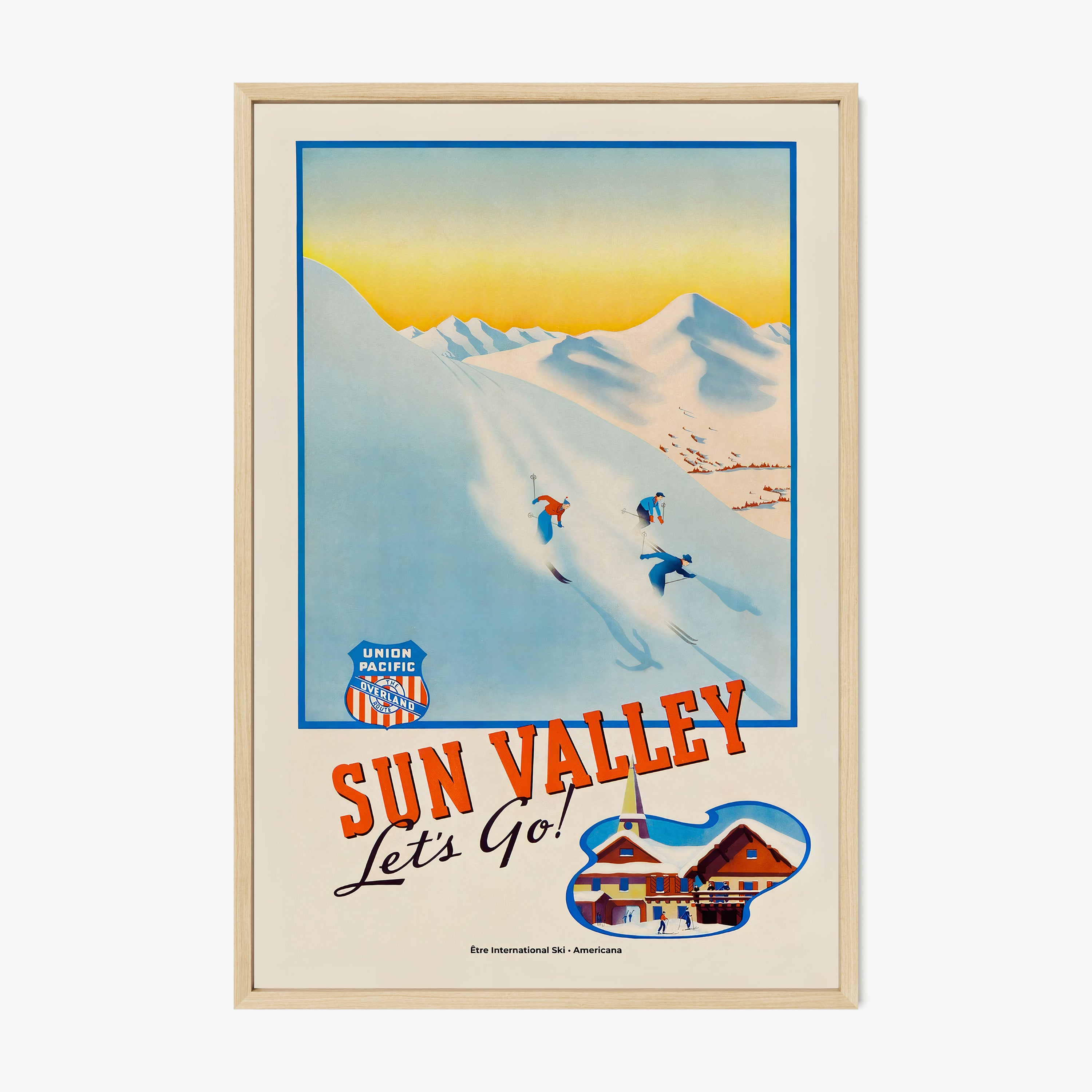 Framed "Sun Valley" poster featuring skier's going down a snowy mountain hanging on a light background