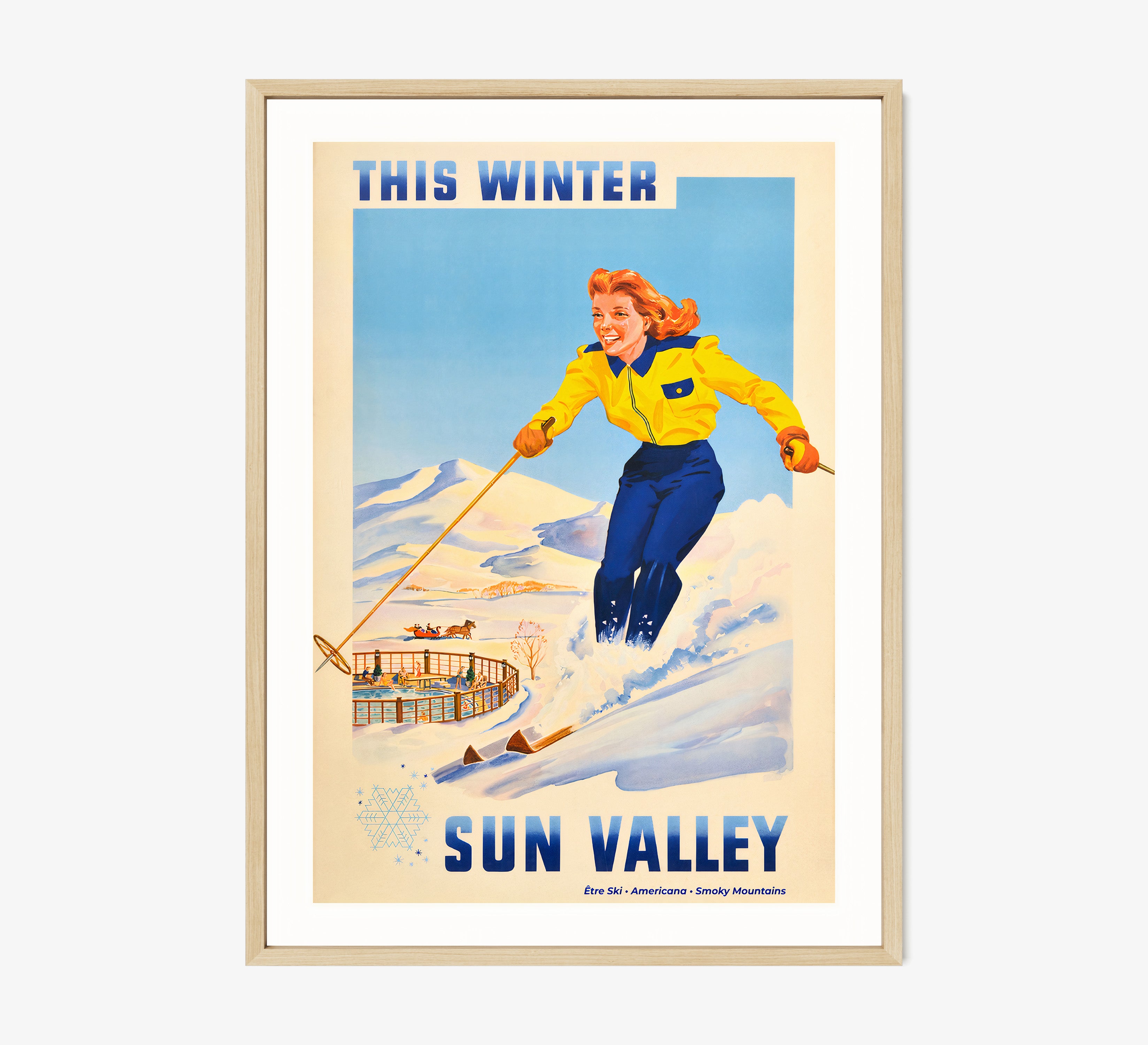 Framed "Sun Valley" poster featuring a woman skiing hanging on a light background