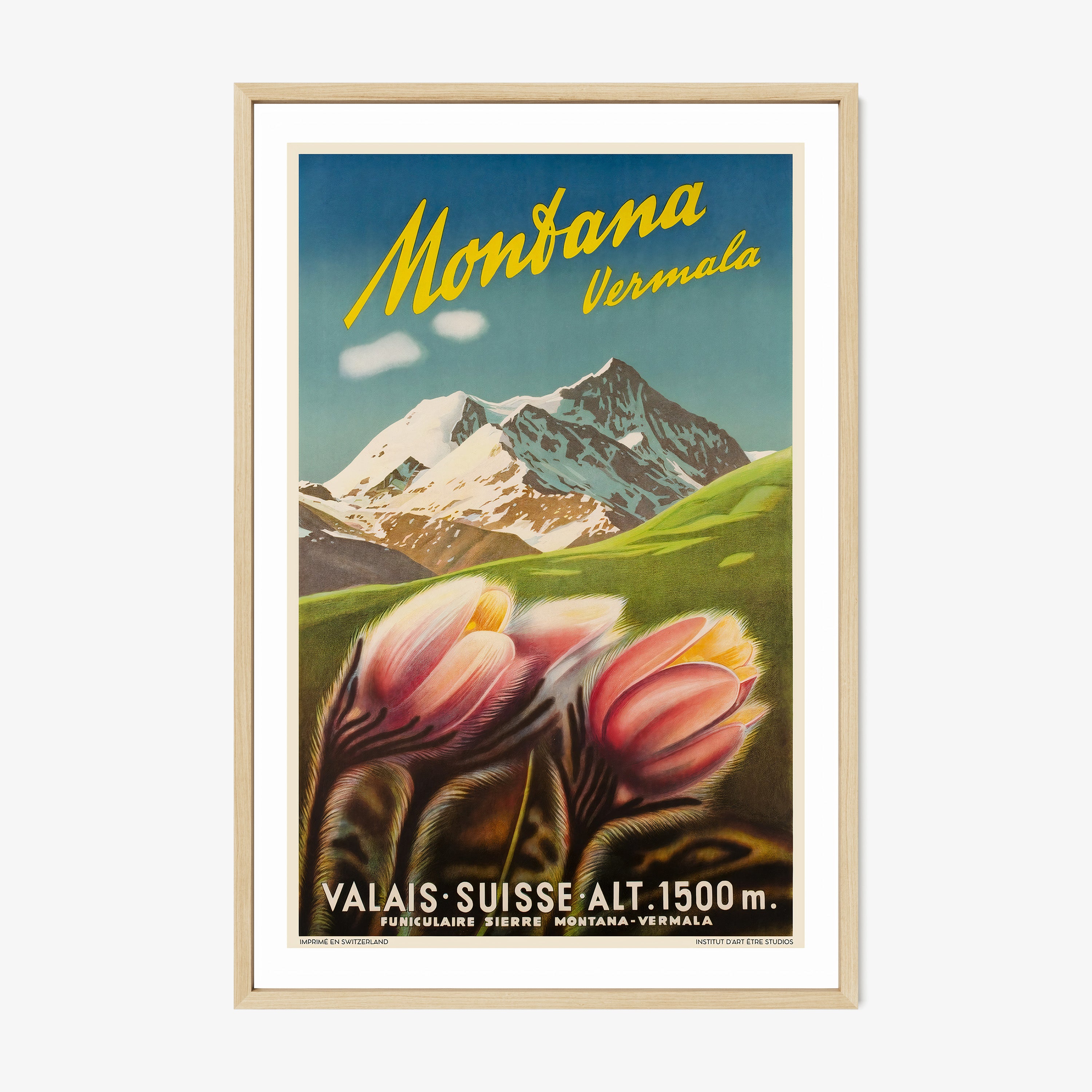Framed poster of a mountain and flowers with 'Montana Vermale' text on a wall.