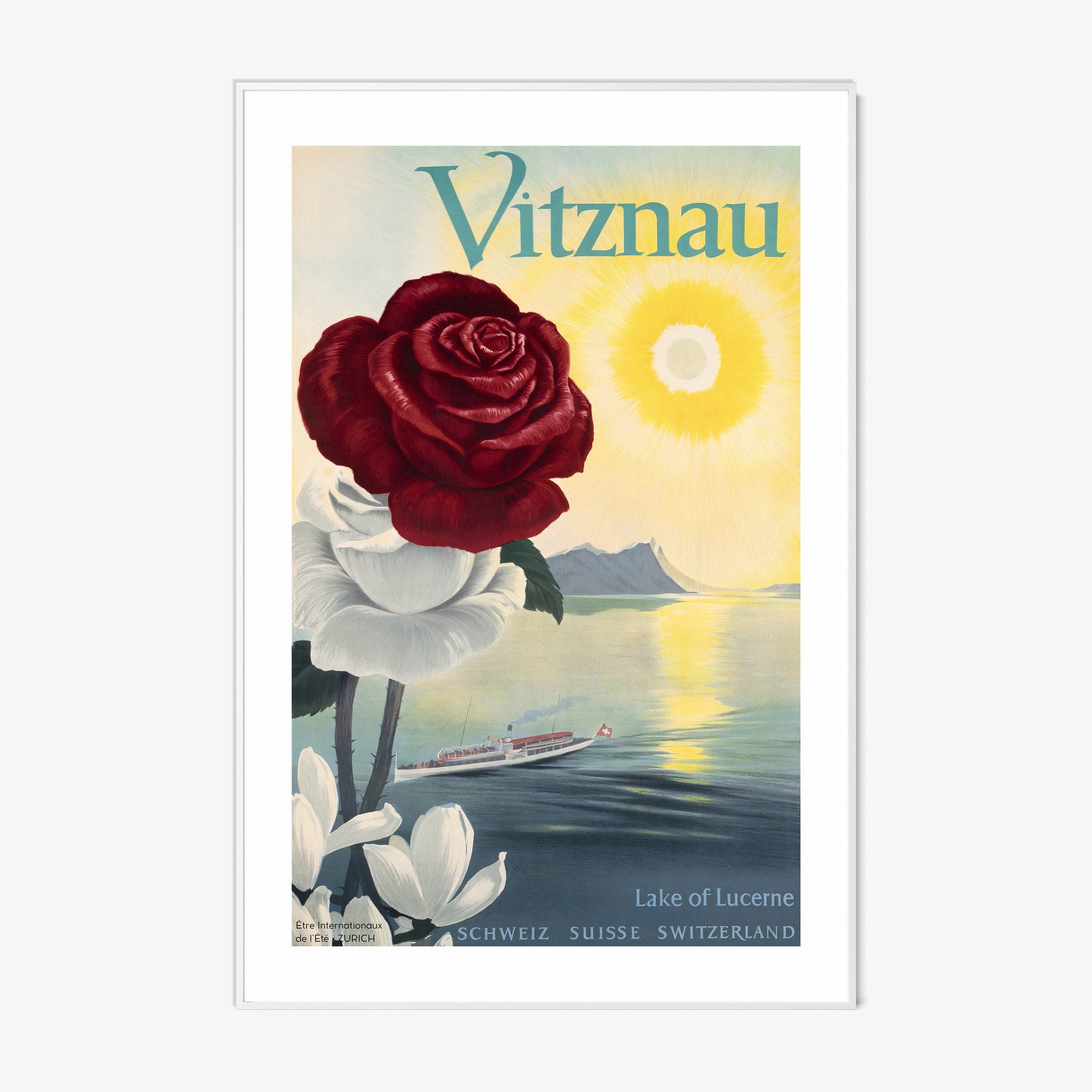 Framed poster of a large rose and an ocean background with the text "Vitznau" at the top hanging on a wall with a light background