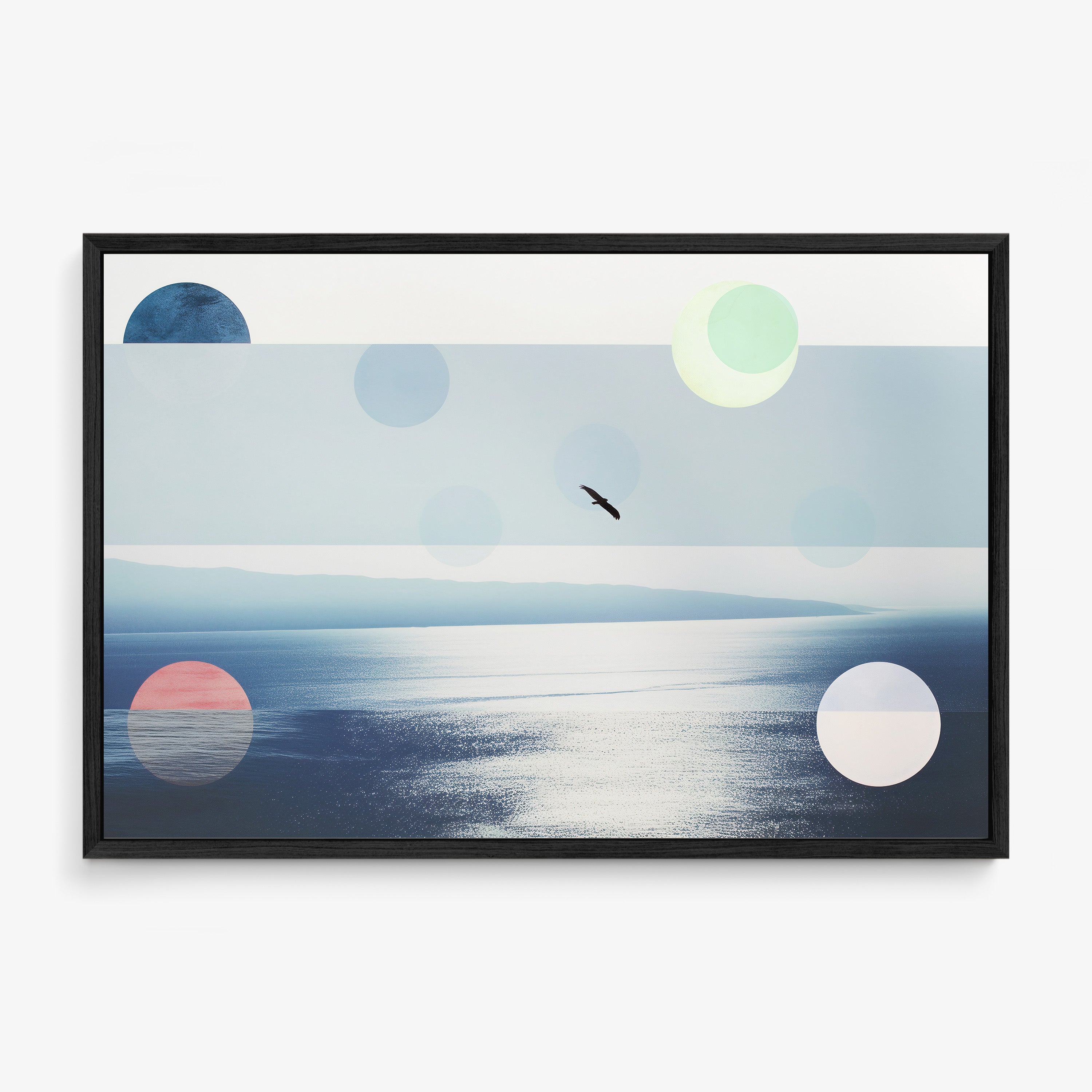 Framed poster featuring an ocean scene with a bird flying hanging on a light background