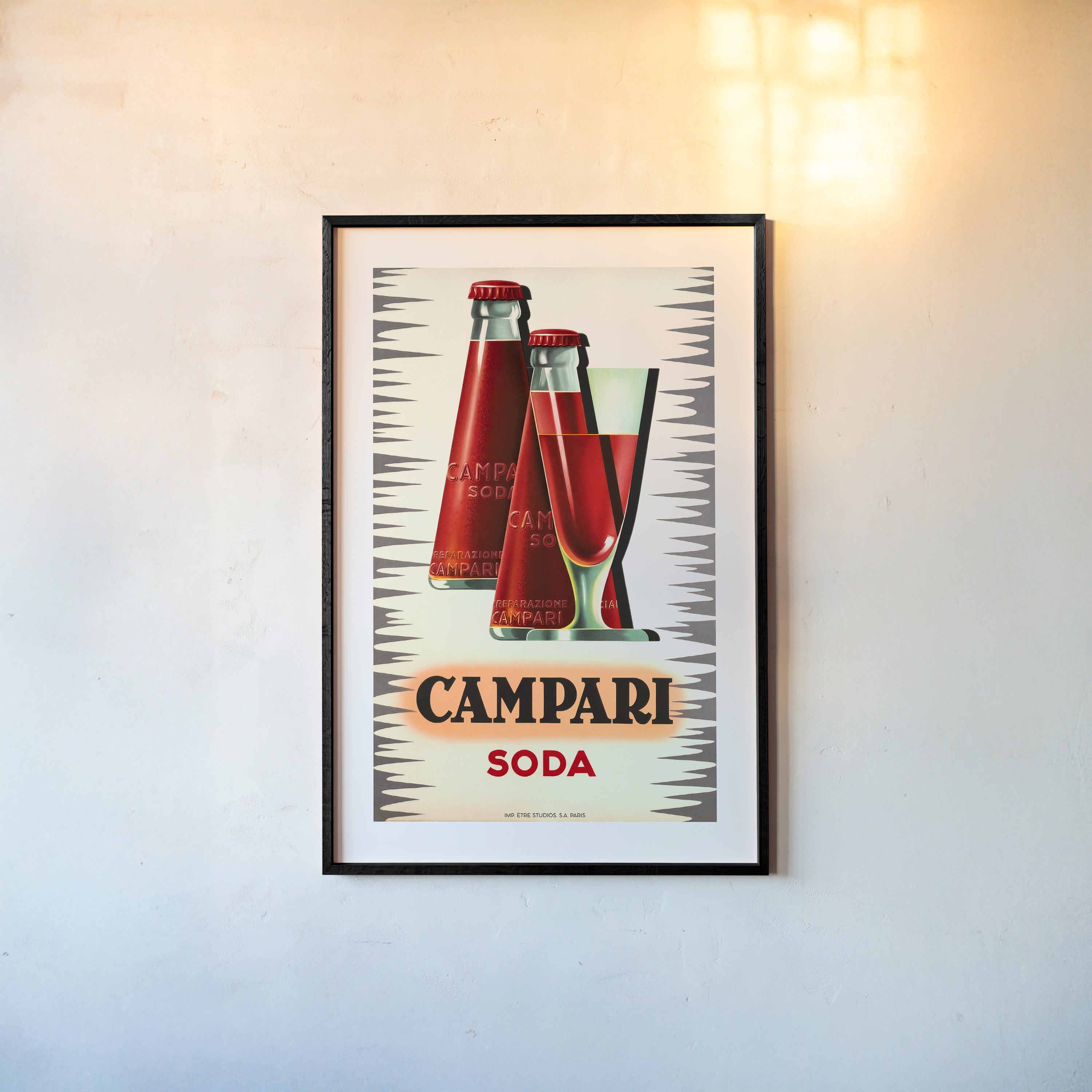 A framed poster features "Campari Soda" 