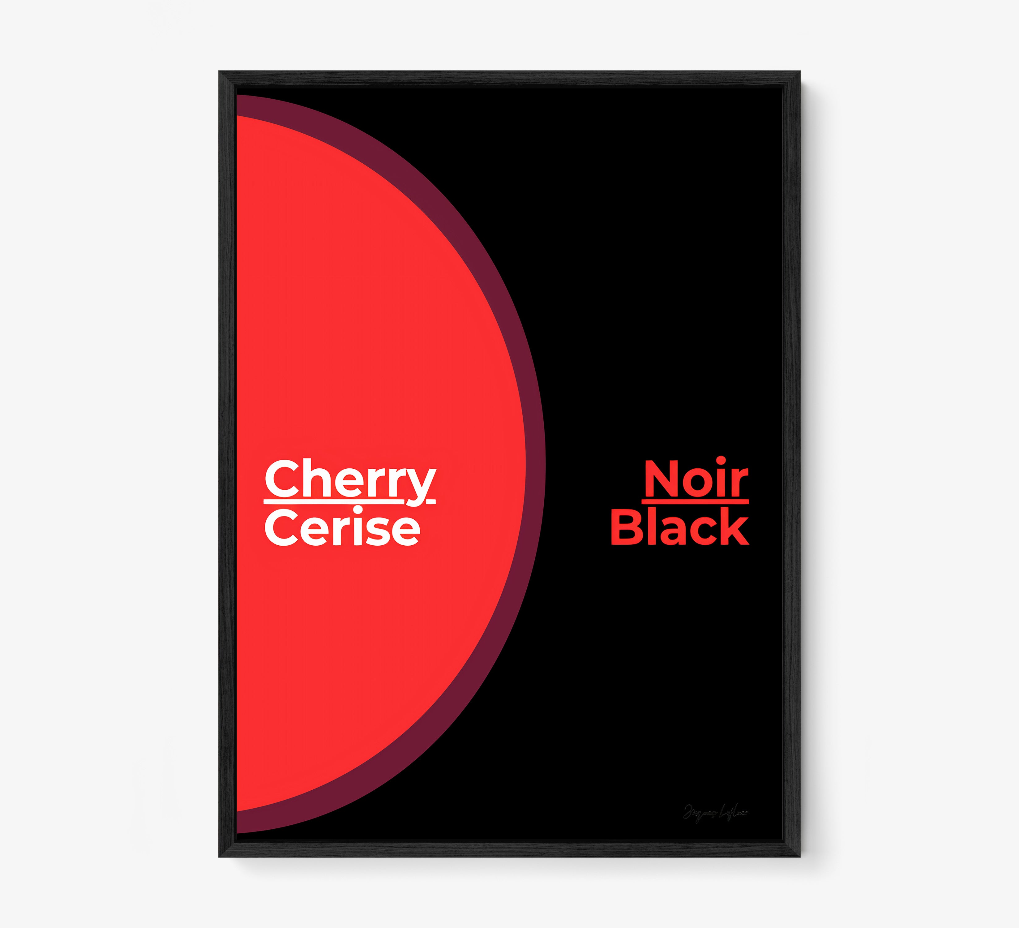 Framed poster of the words "Cherry Black" in English and French hanging on a light background