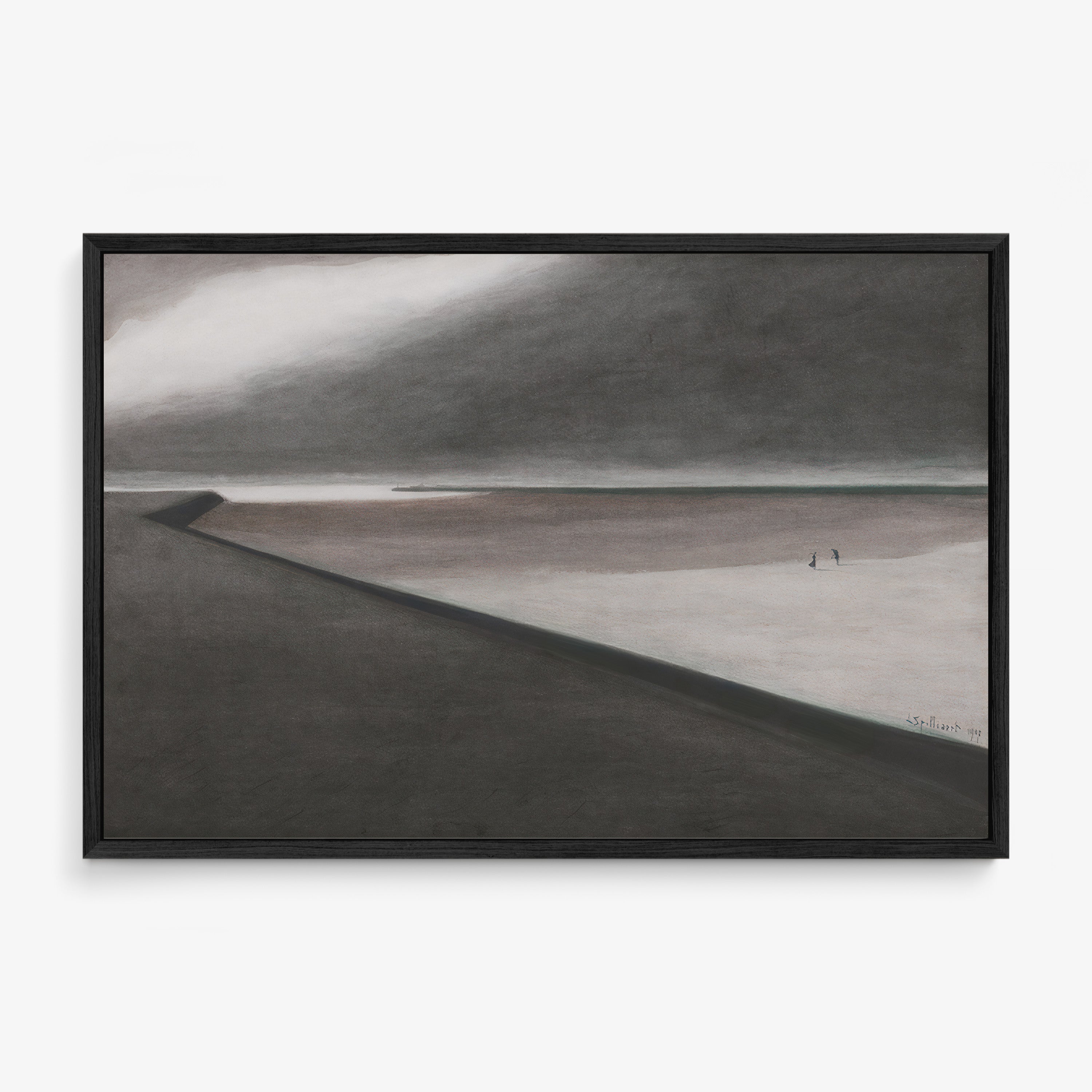 Framed poster of a dark beach scene hanging on a light background
