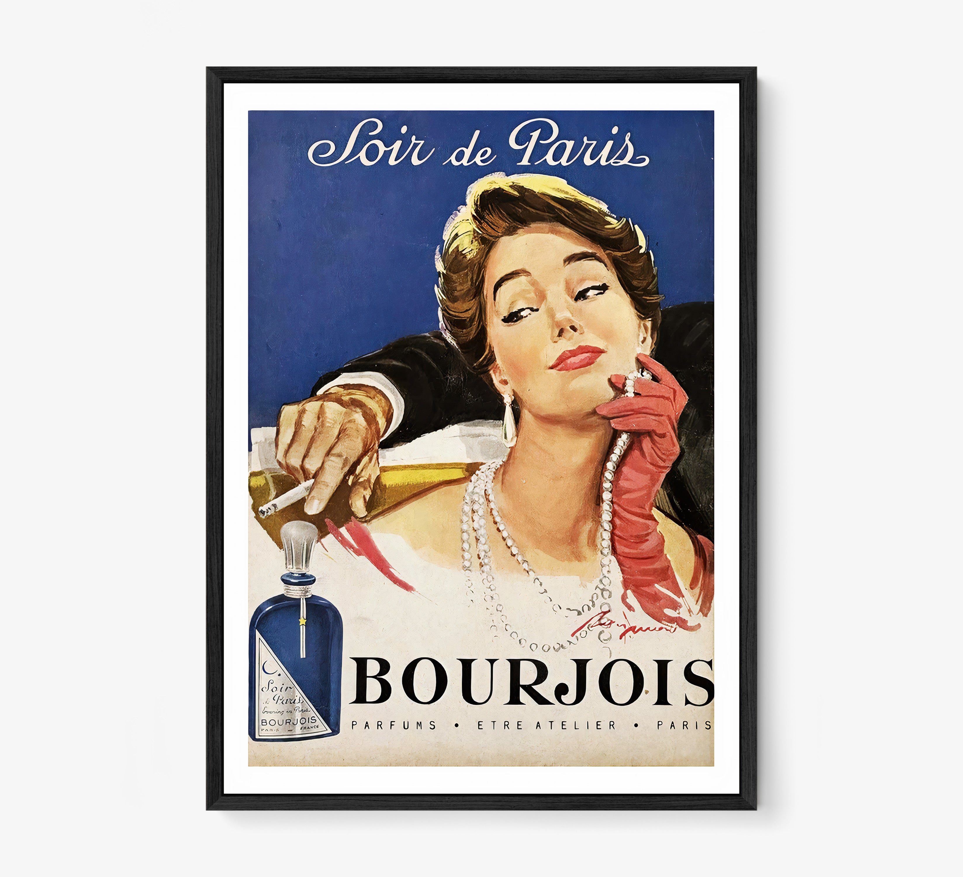 Framed image of an elegant woman with the text "Soir de Paris" at the top hanging on a light background