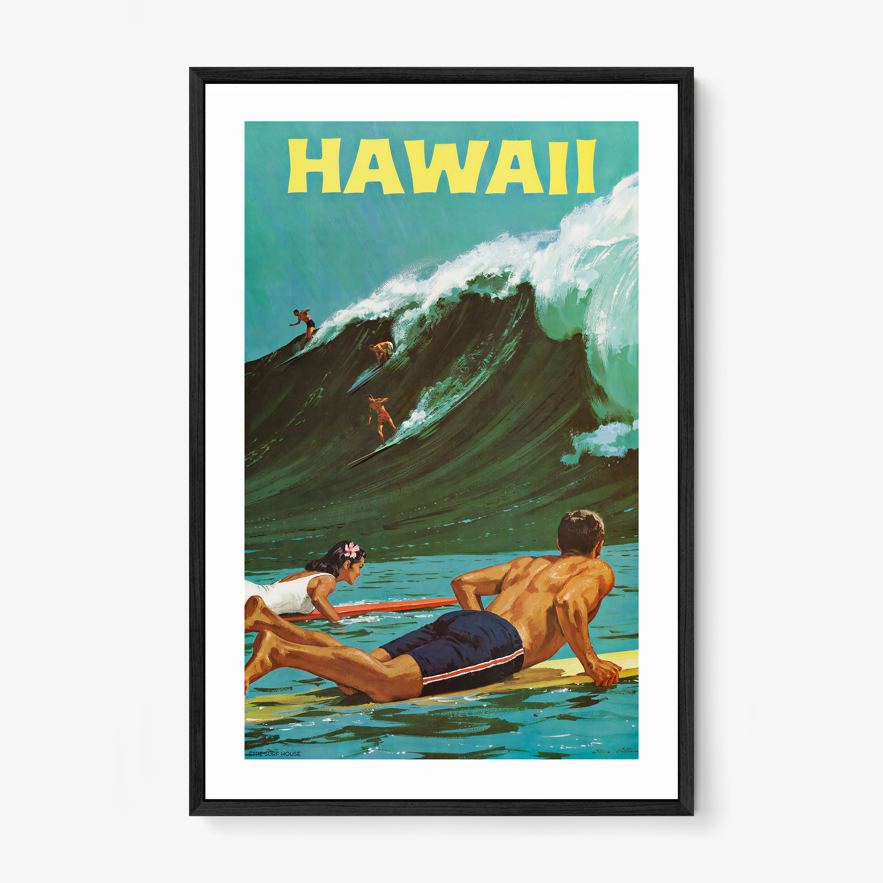 Framed "Hawaii" poster featuring surfers on a big wave hanging on a light background