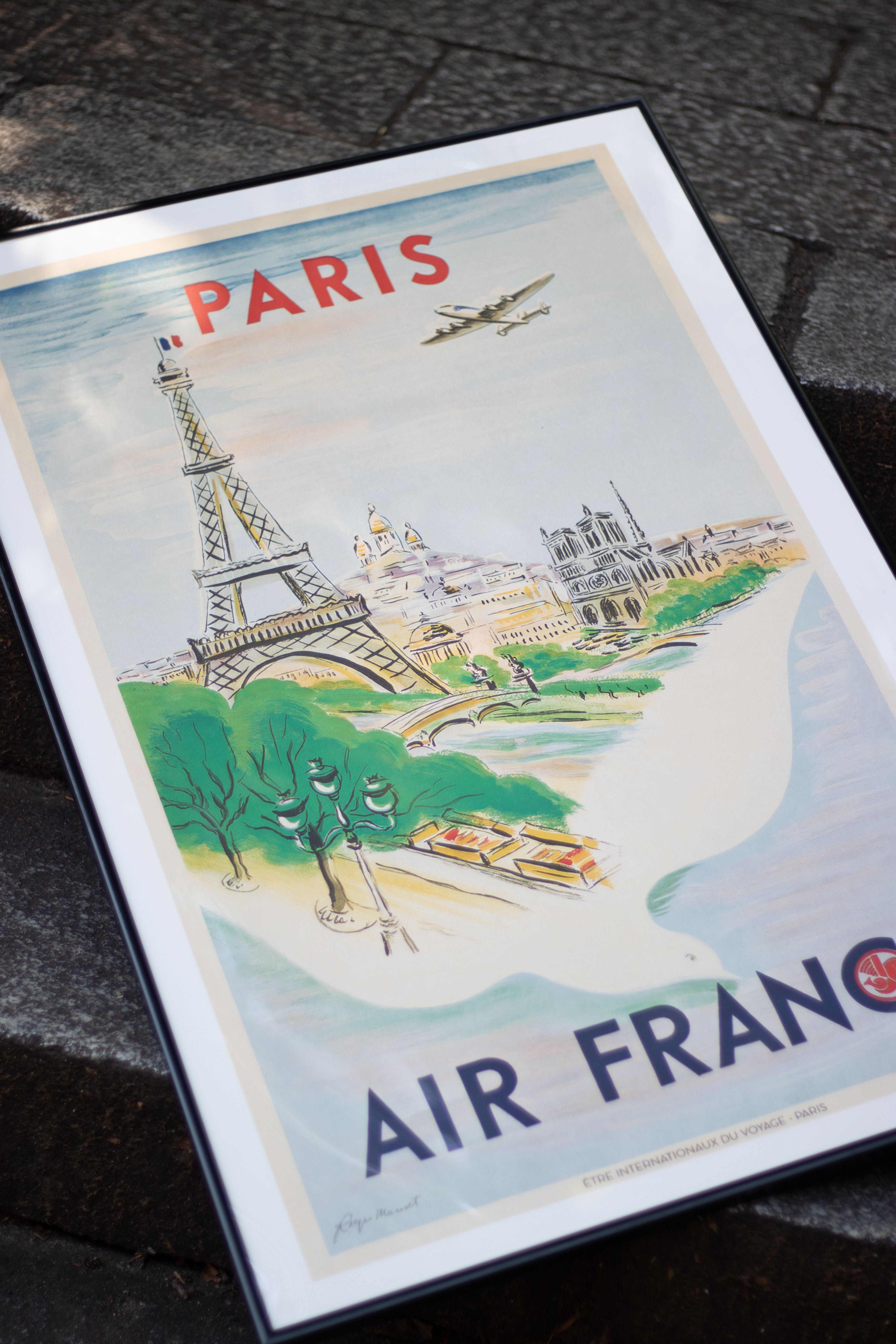 Vintage-style travel poster for Paris featuring the Eiffel Tower and塞纳河, with 'Air France' branding.