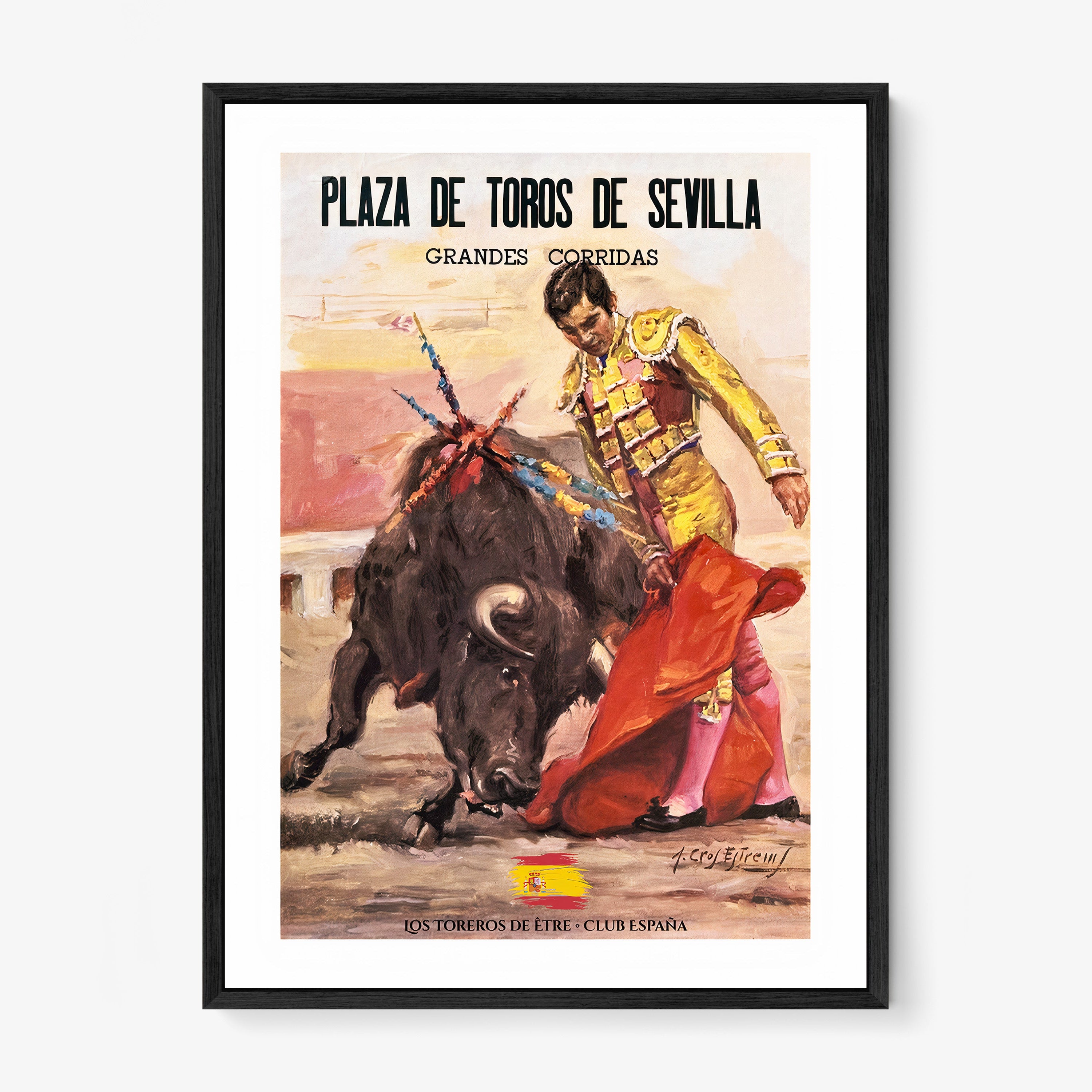 Framed poster of a bullfighter hanging on a light background