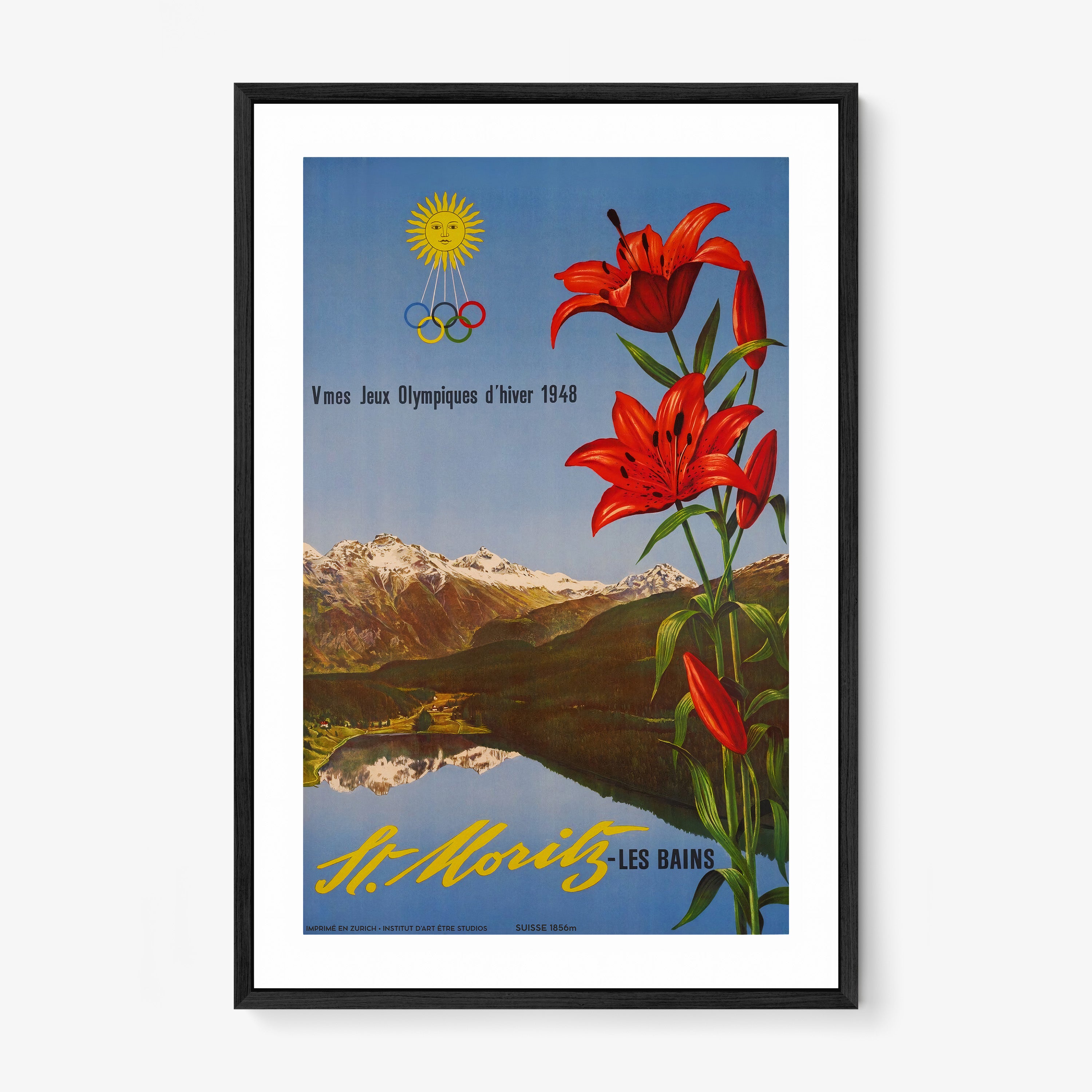 Framed poster with red flowers and mountain landscape on a wall.