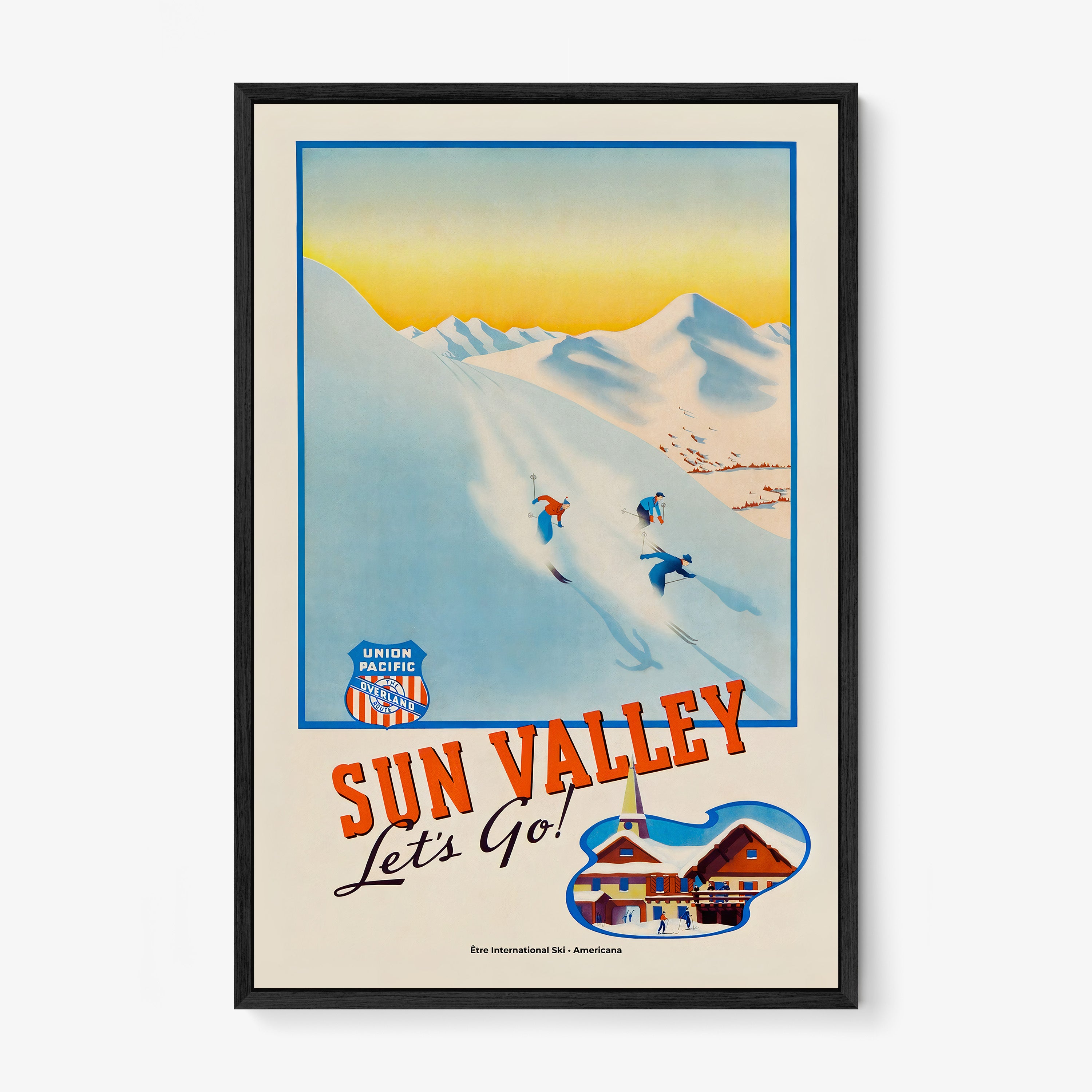 Framed "Sun Valley" poster featuring skier's going down a snowy mountain hanging on a light background