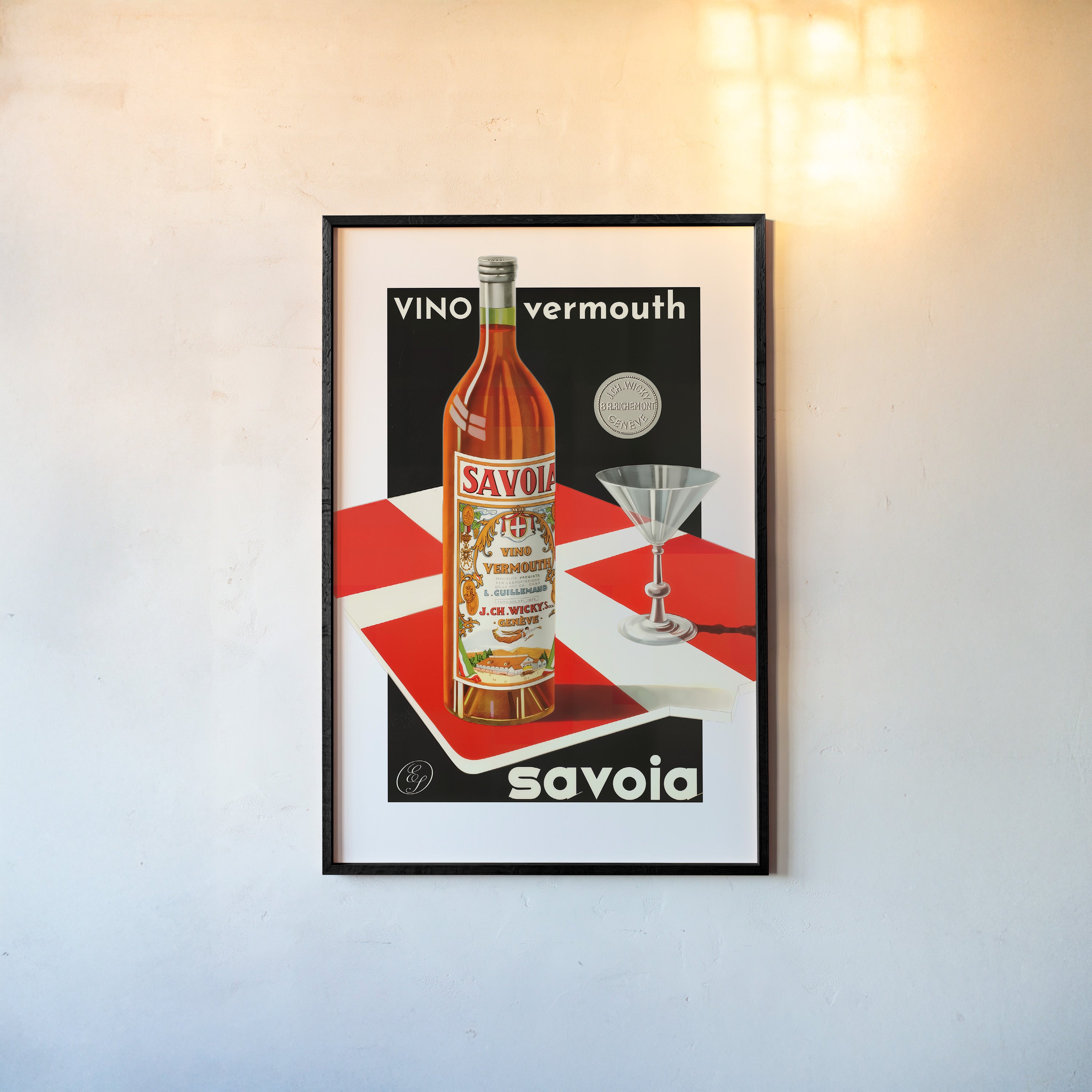 A framed poster features a bottle of vermouth and a cocktail glass in a bold graphic style.