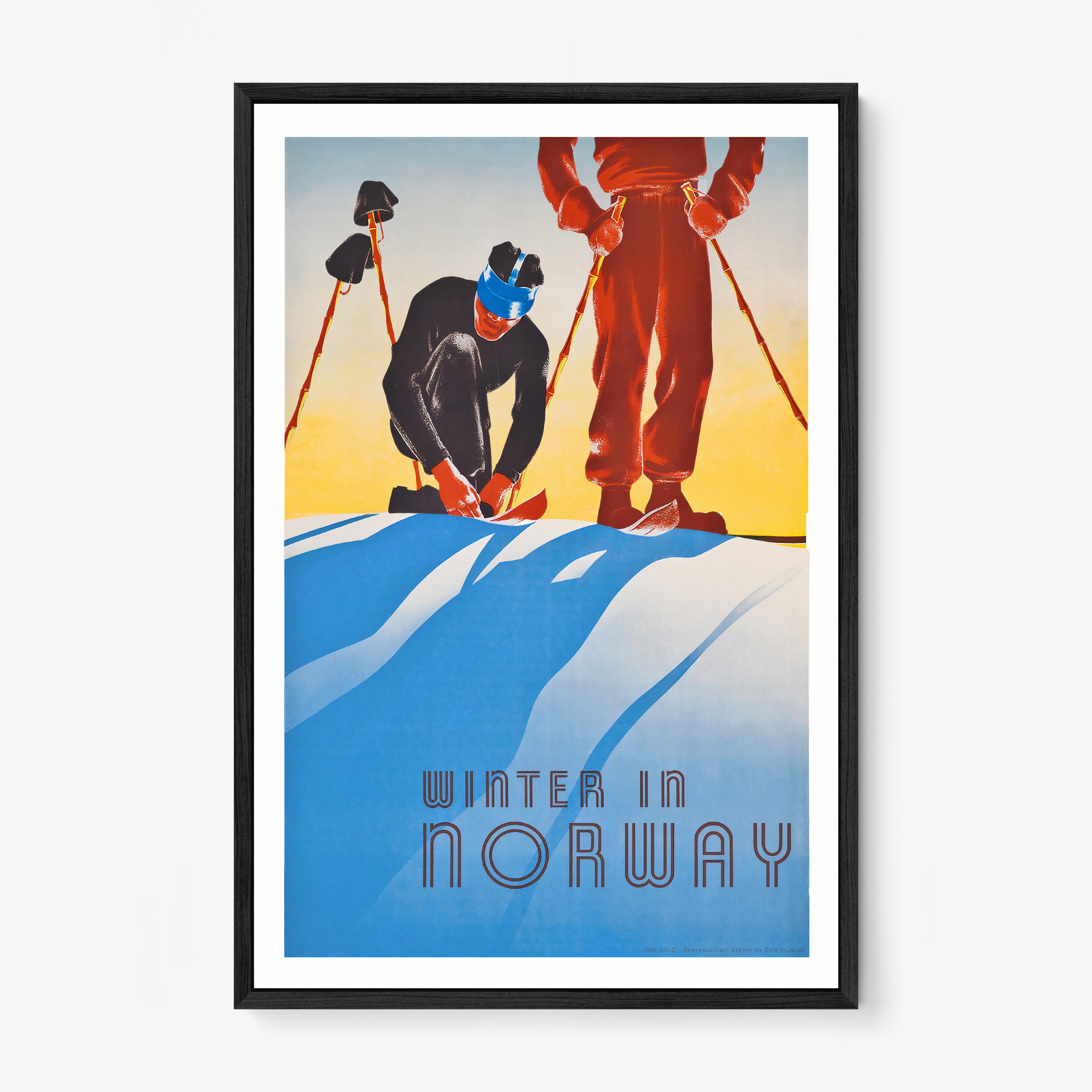 Framed poster featuring two stylized skiers adjusting their equipment against a serene blue and yellow snowy backdrop